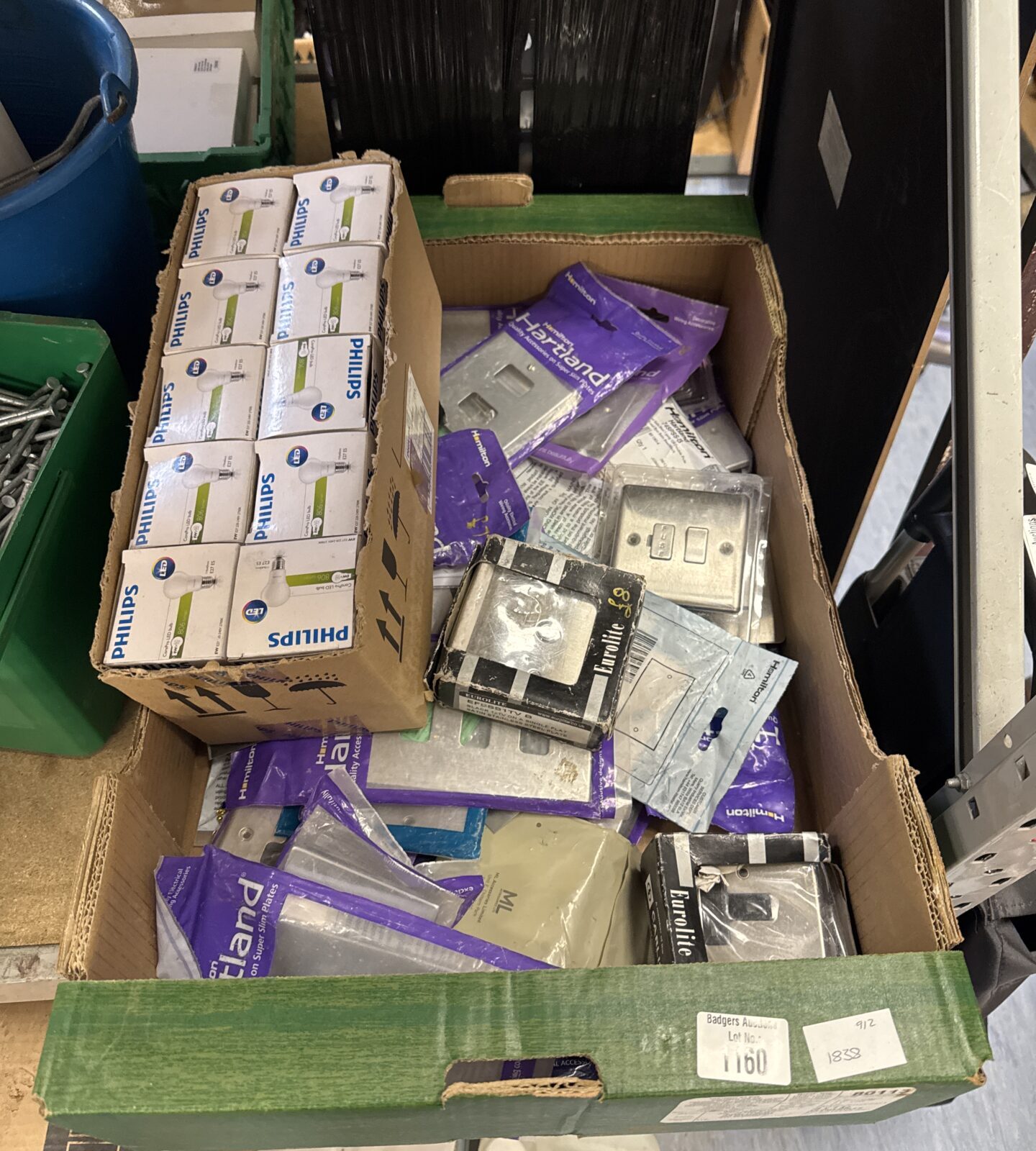 Box of assorted sockets & switches with some light bulbs