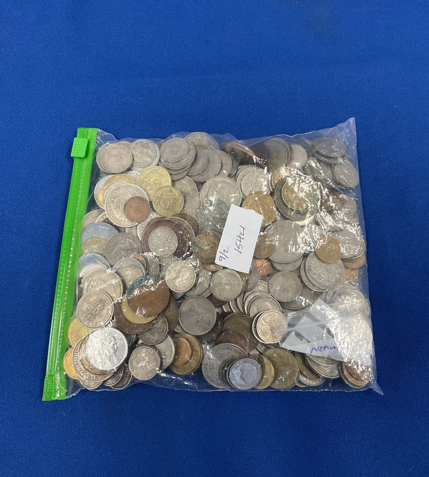 Bag of mixed uk & foreign coins