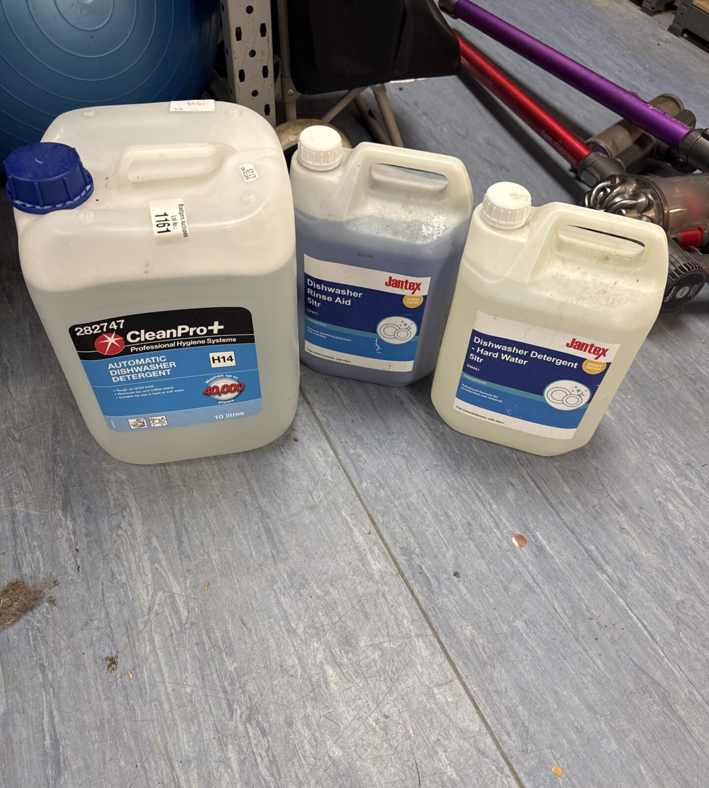 Three bottles of dishwasher detergent