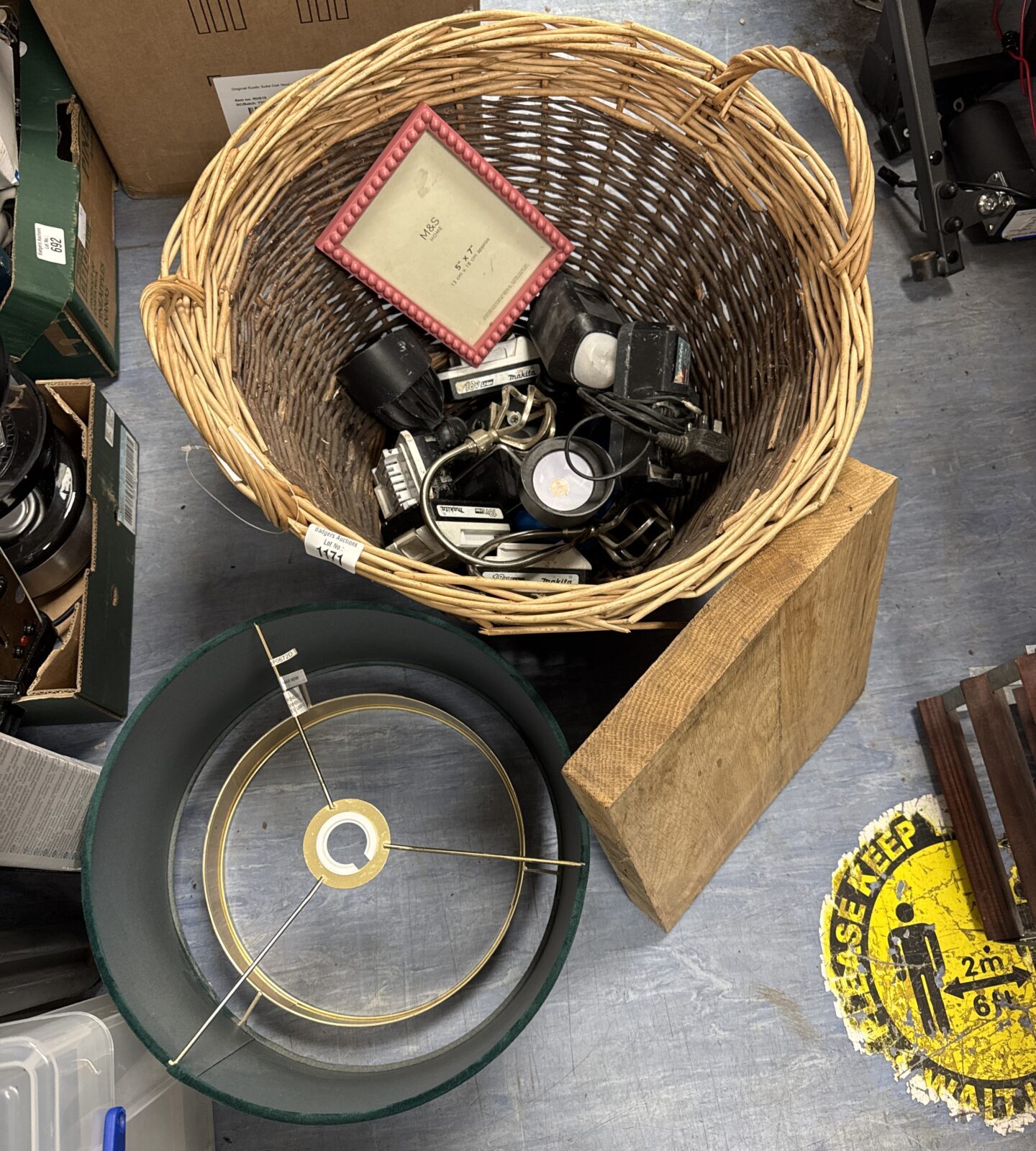 Basket of mixed shed clearance items with a lampshade & chopping block