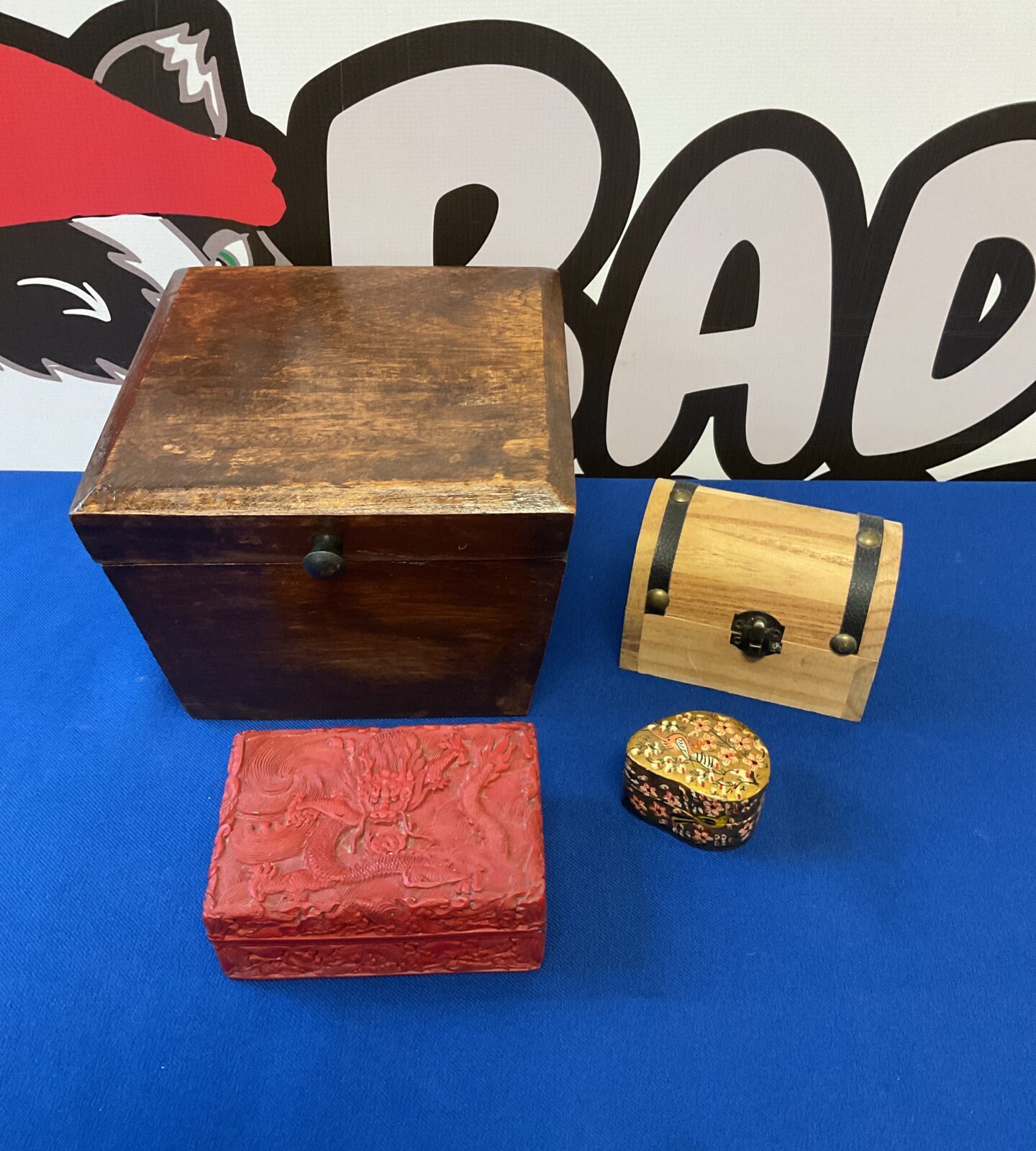 Selection of wooden trinket boxes including chinese dragon box