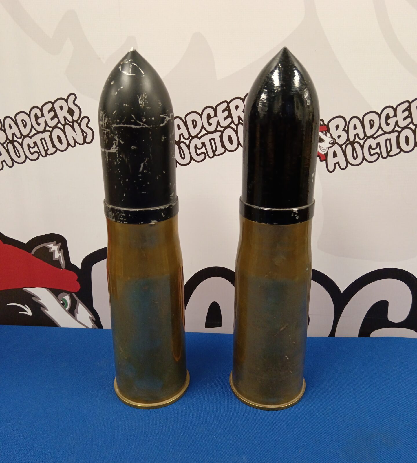 Pair of 1973 military 76mm canon shells