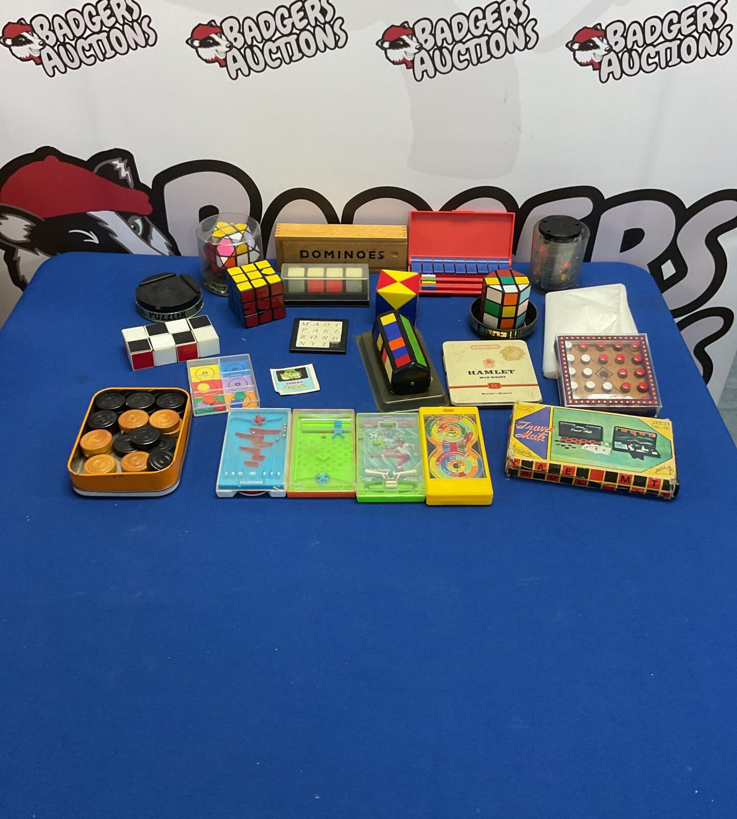 Selection of vintage games and puzzles inc rubiks cubes and Tomy Poketeers