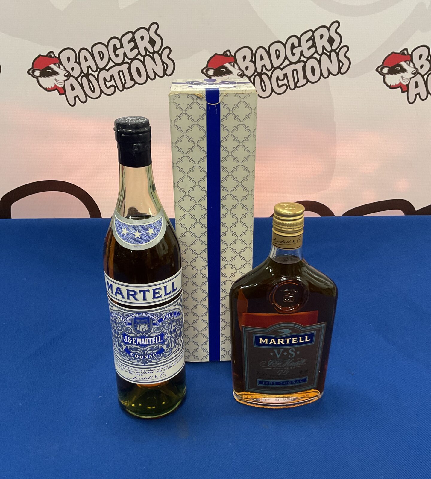 Two Sealed bottles of martell fine cognac