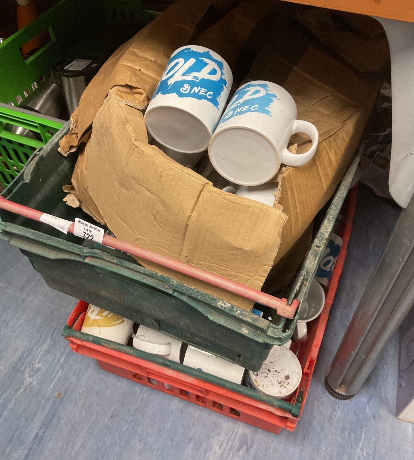 Three crates of bold & nec mugs