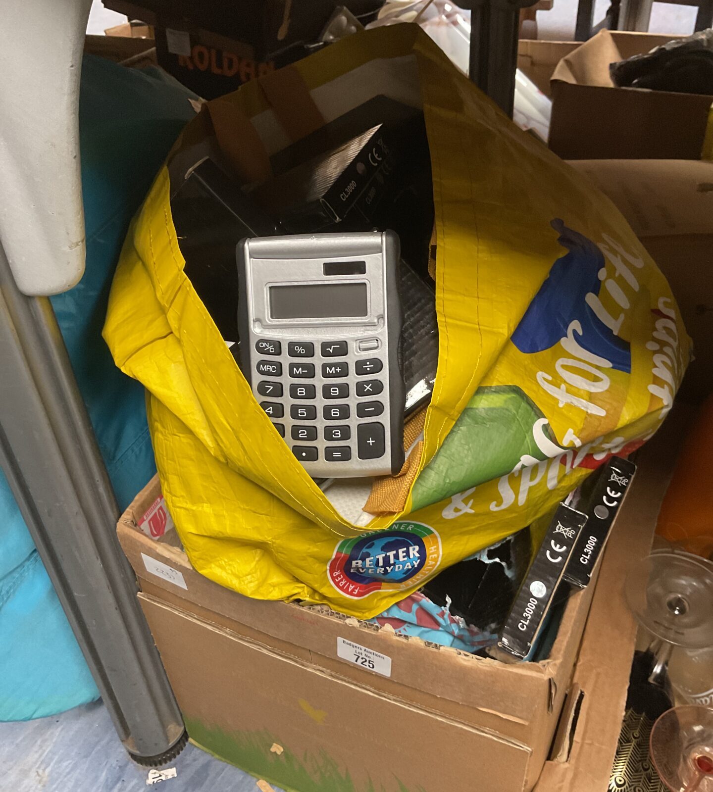 Two bags of promotional solar powered calculators