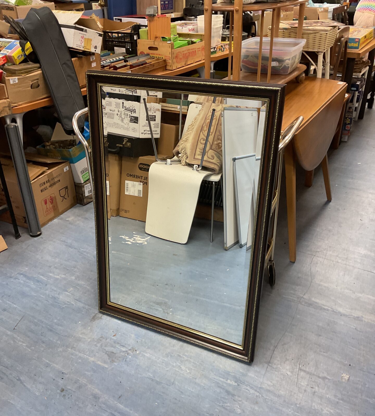 Bevel edged mahogany framed mirror