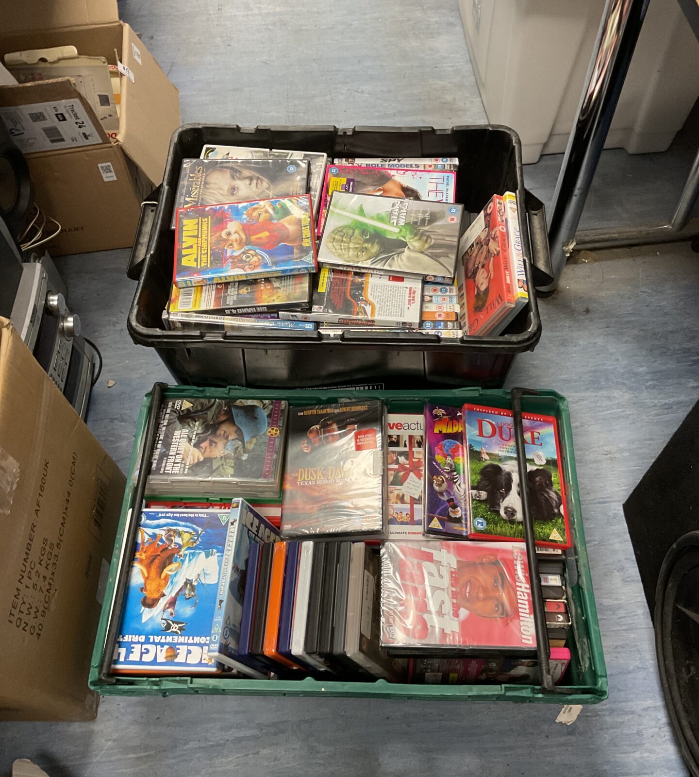 Two large boxes of dvds