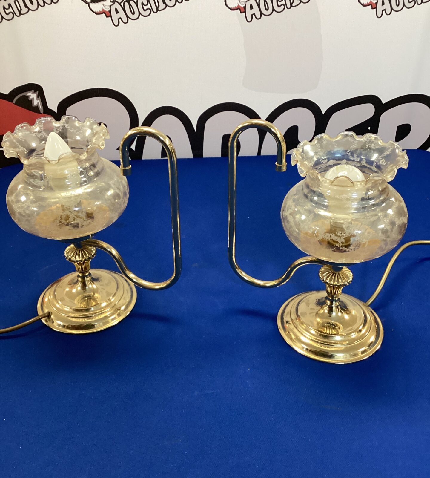 Two oil lamp style table lamps with glass shades