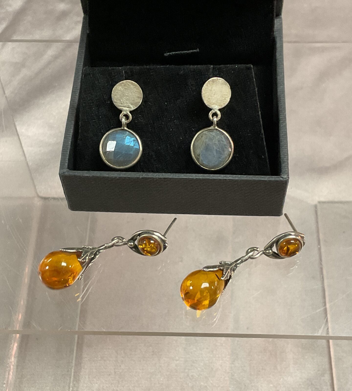 Two pairs silver earrings inc amber