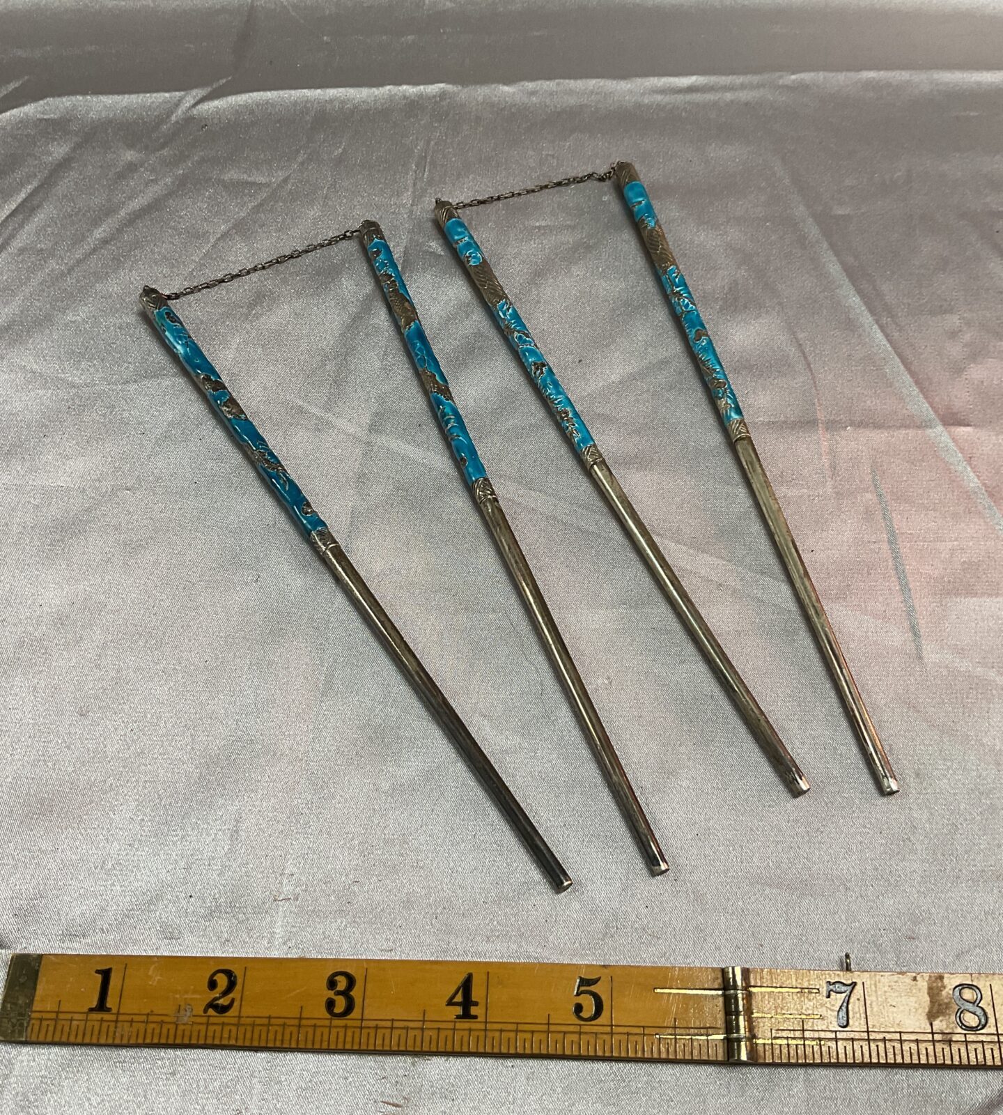 Two pairs of silver enamel chop sticks