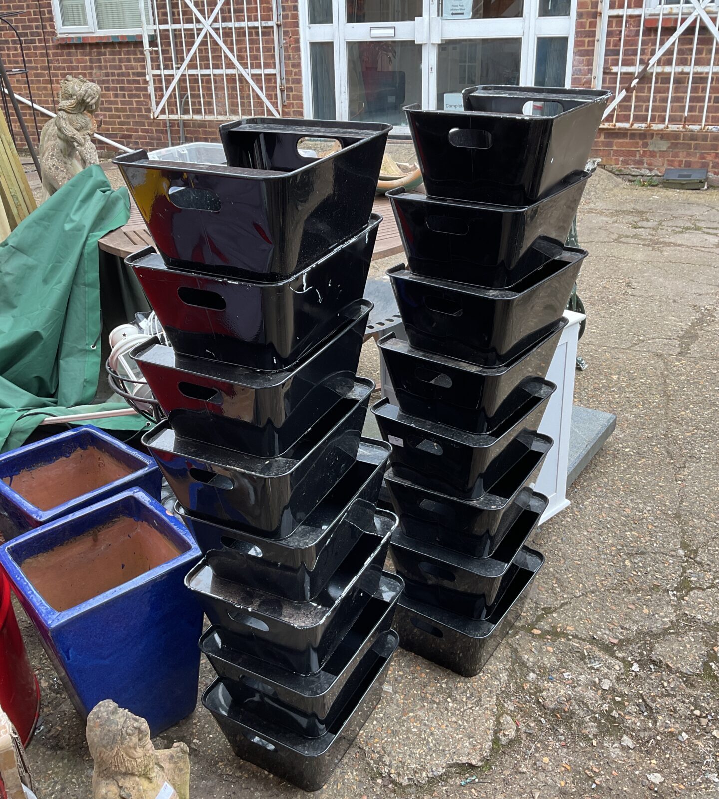 Large lot of black metal storage trays