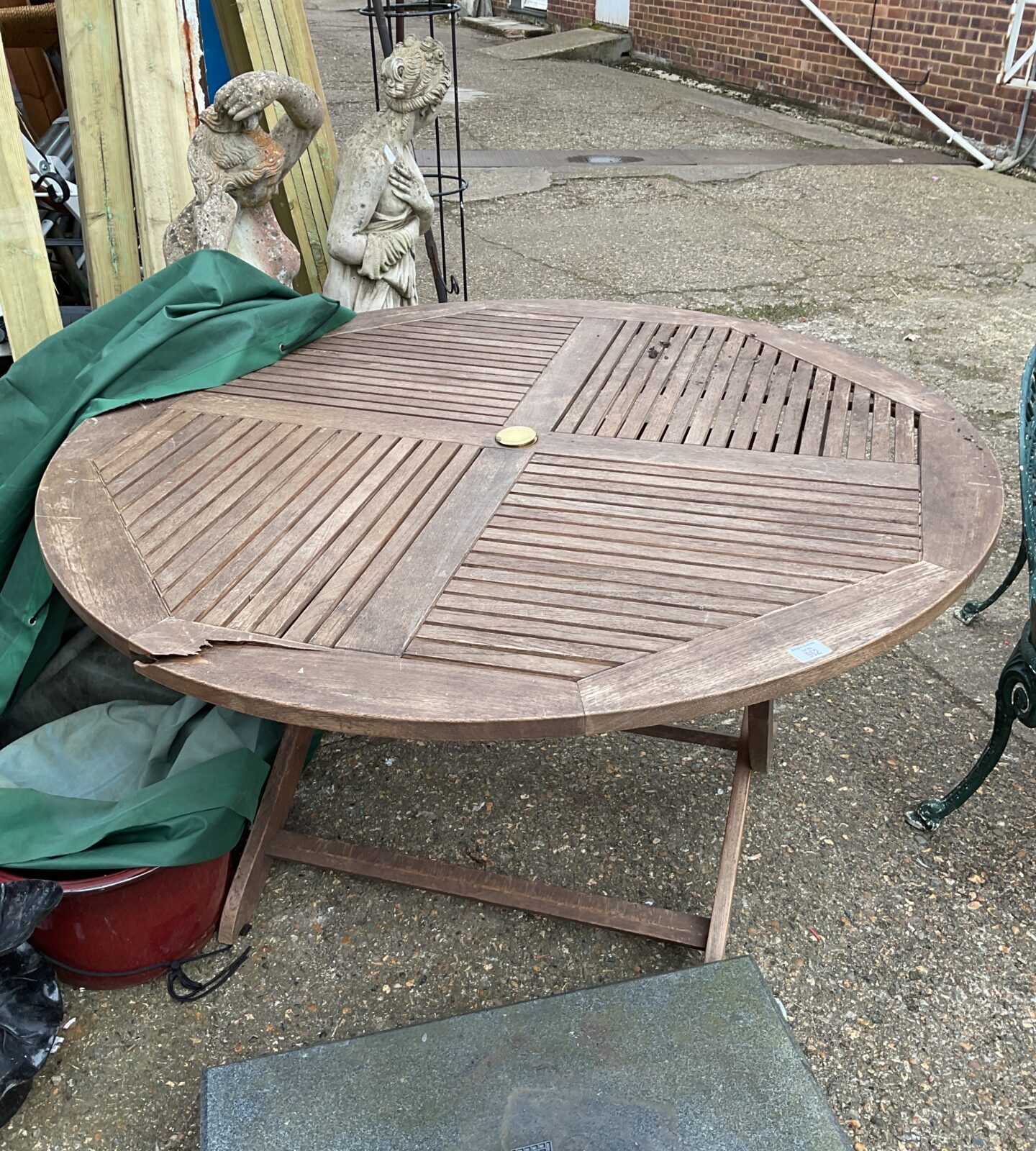 Teak garden table with cover (needs repair)