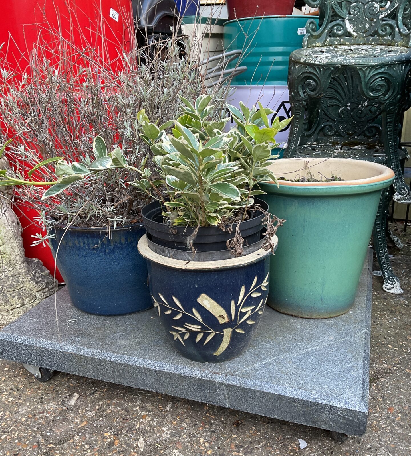 Three blue glazed plant pots