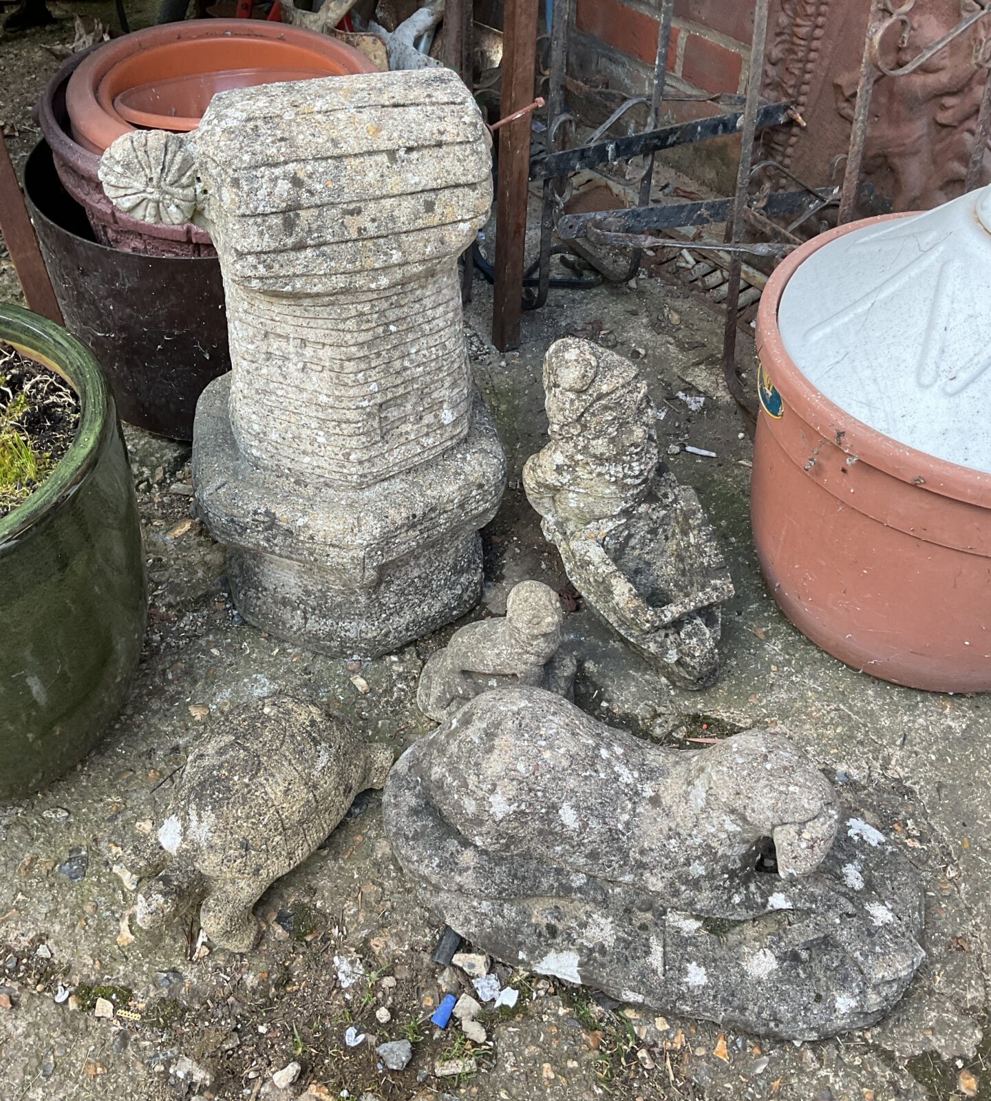 Five concrete garden ornaments