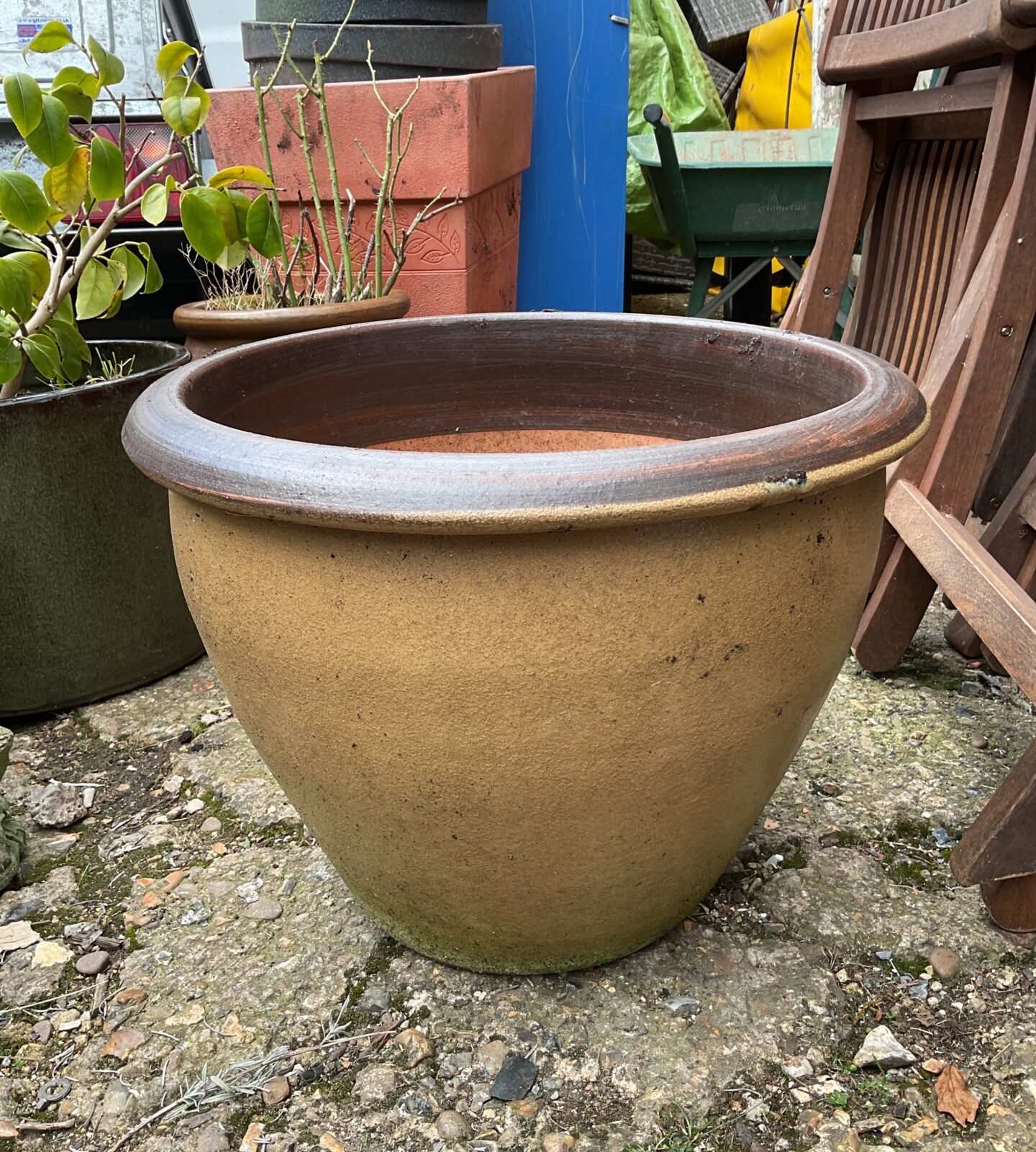 Large brown glazed terracotta plant pot