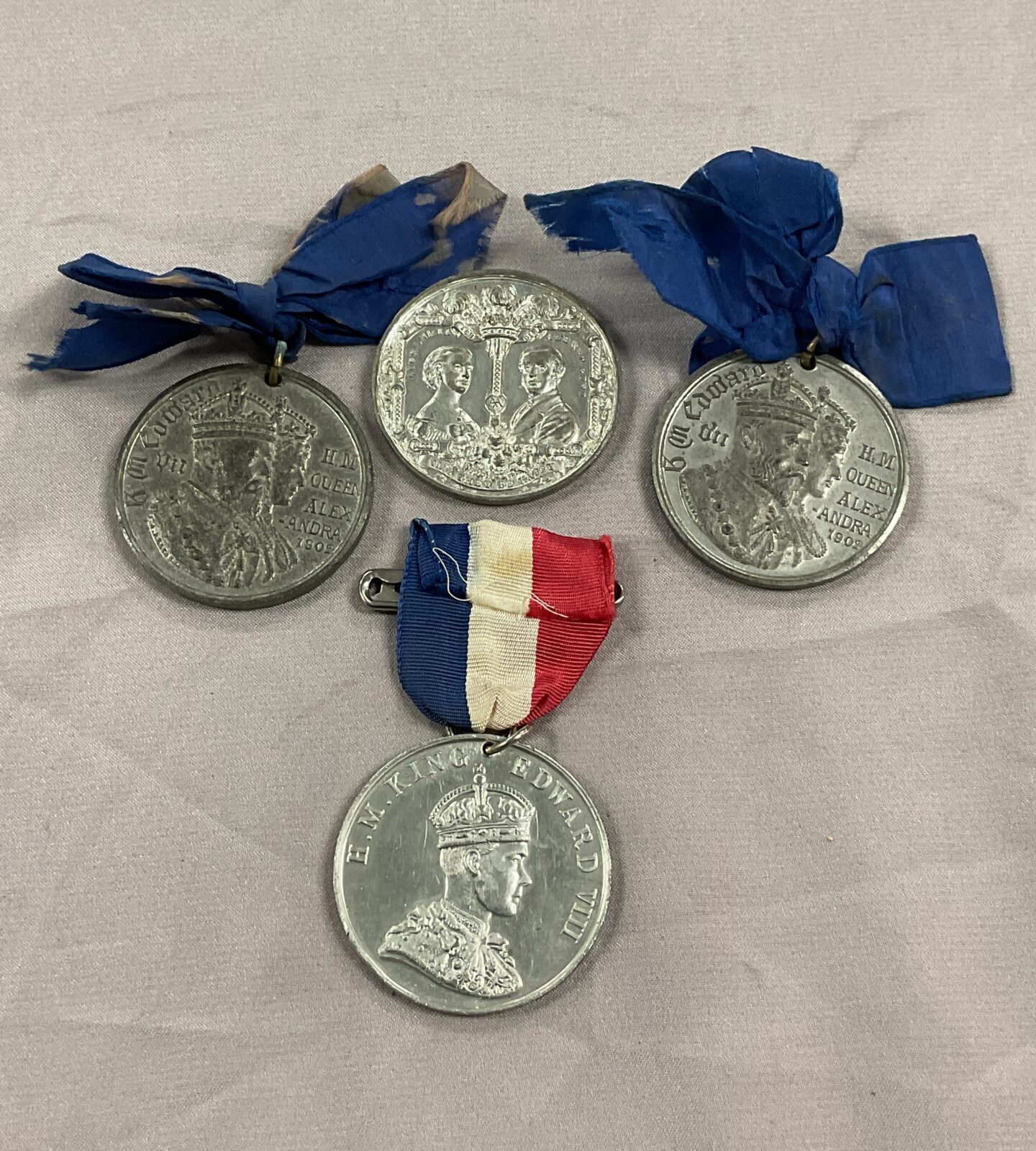 Three Edward vil commemorative medals two coronation and one wedding and one wedding and Edward vill coronation medal