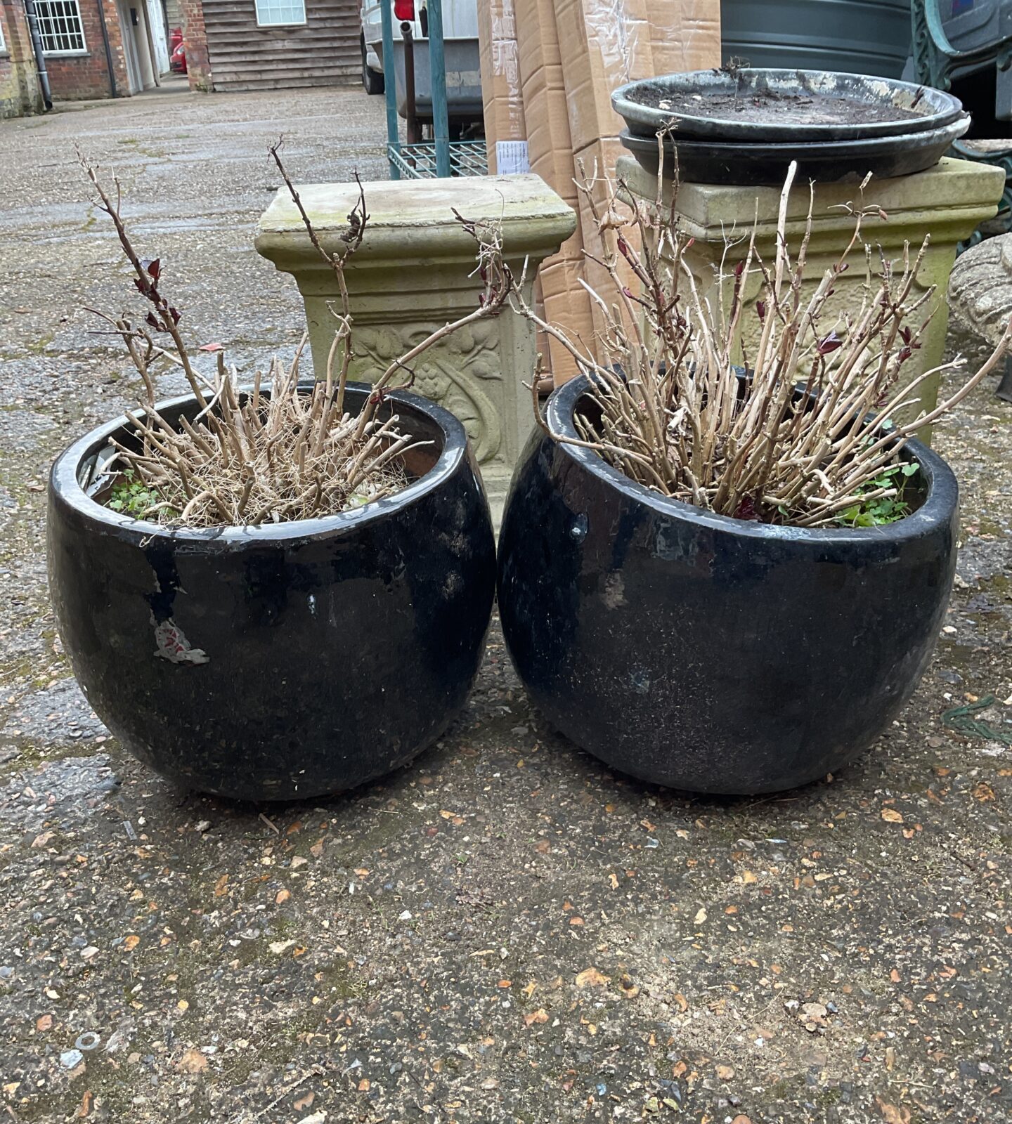 Two black plant pots