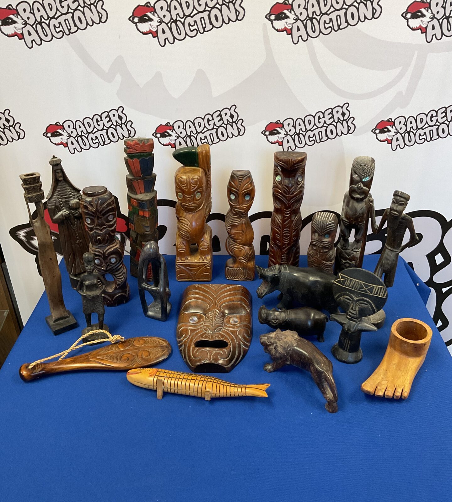 Collection of tribal mauri & African hardwood carved figures & totems