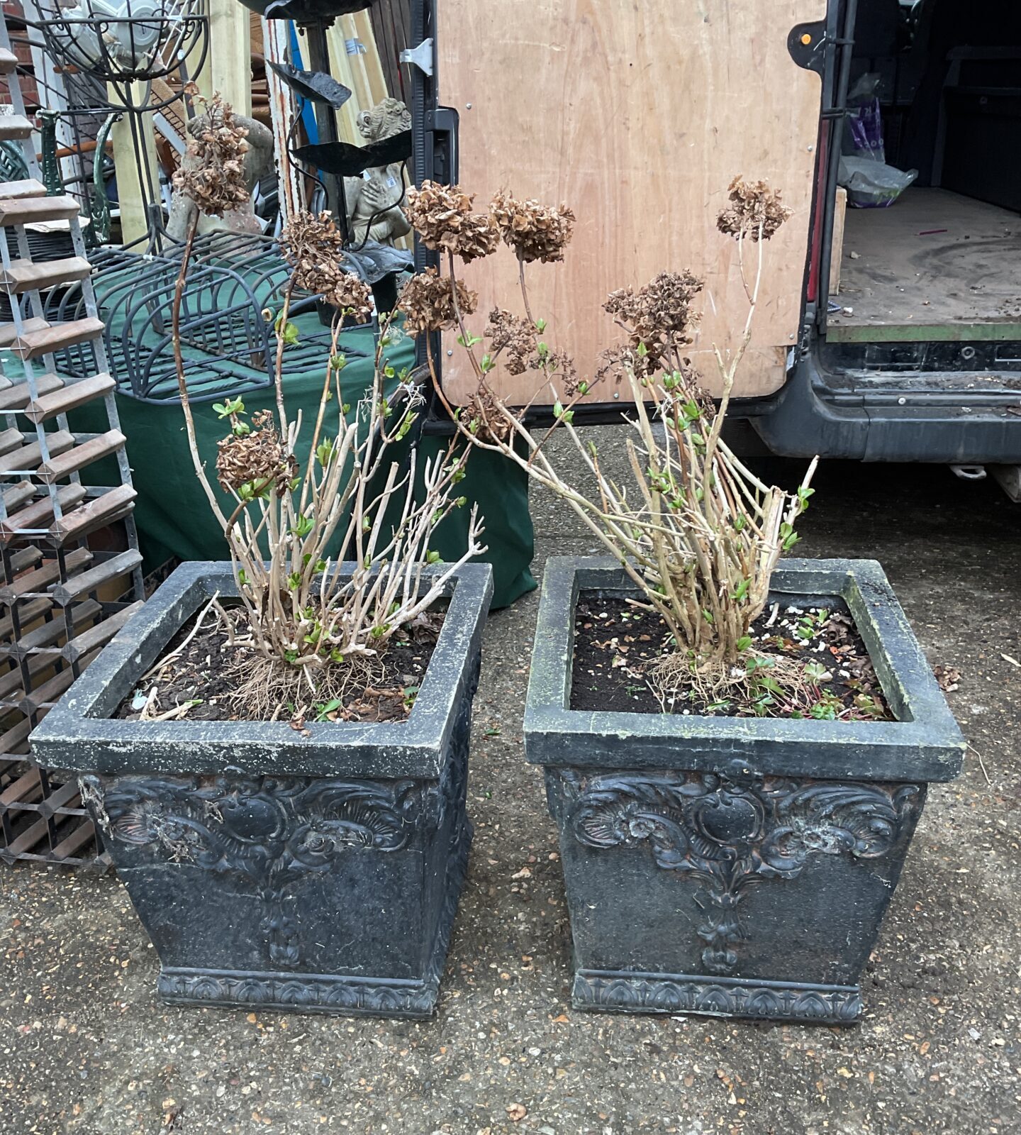 Pair of large decorative garden plant pots