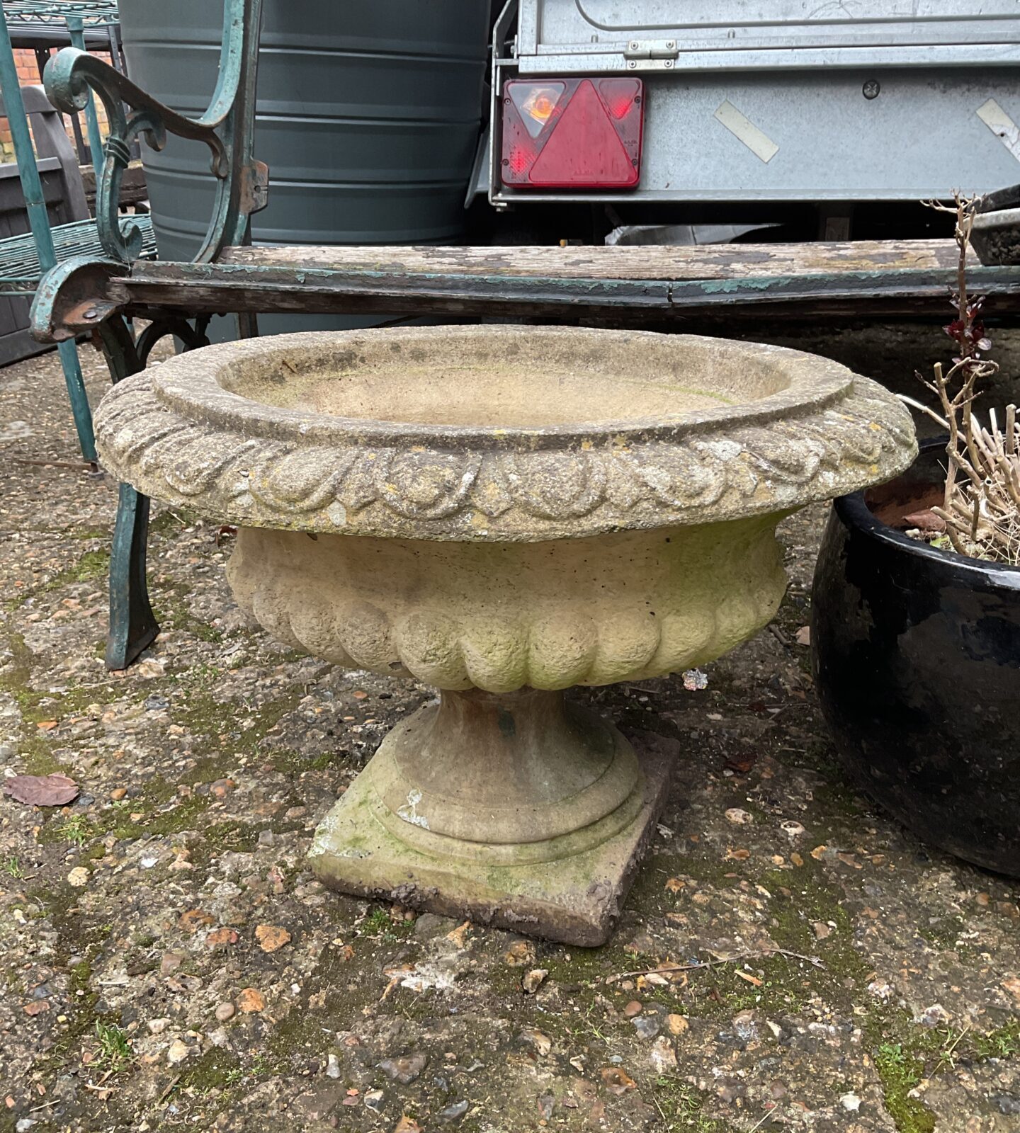 Large concrete pedestal planter