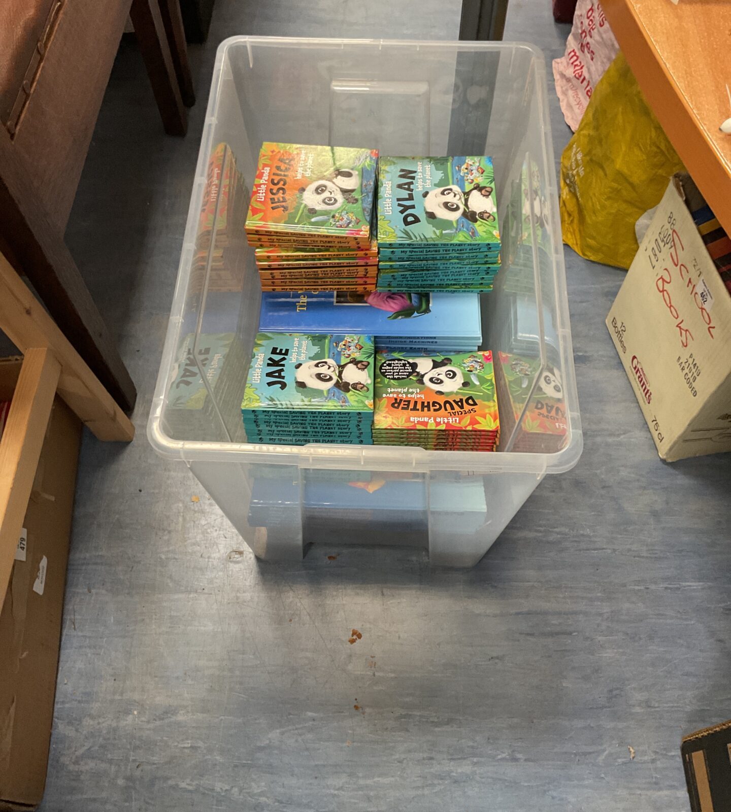 Box containing collection of disneys the wonderful world of knowledge books and special saving the planet books ( assorted names )
