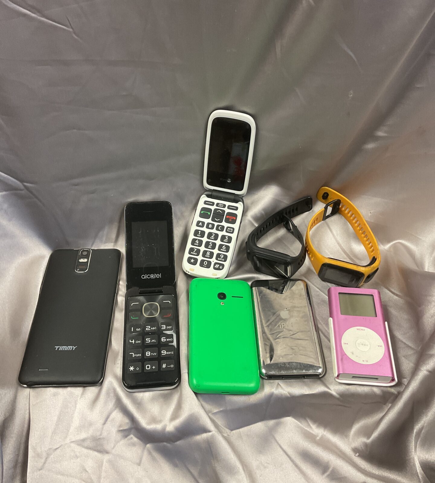 Selection of phones, apple ipods & tomtom watches