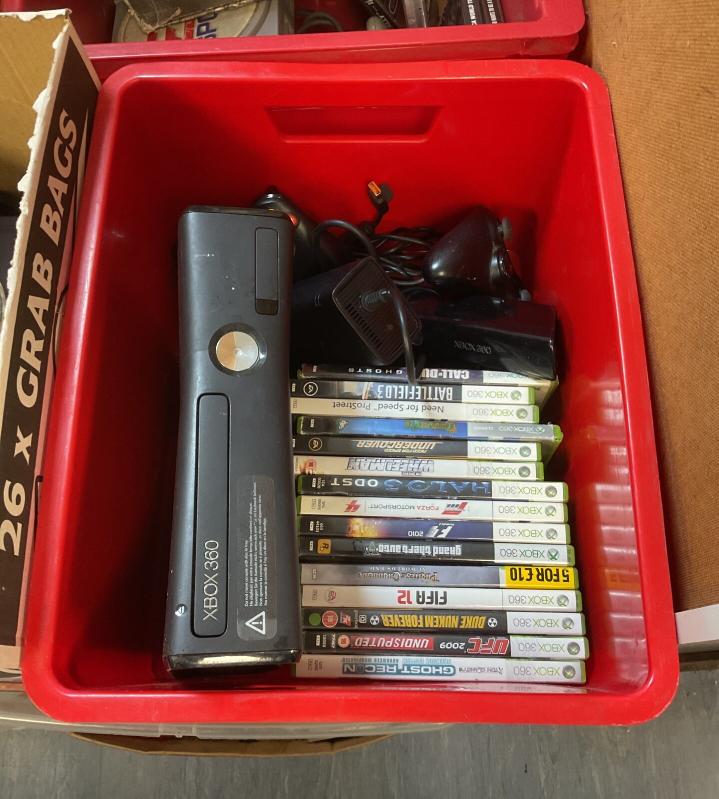 Microsoft Xbox 360 console with games