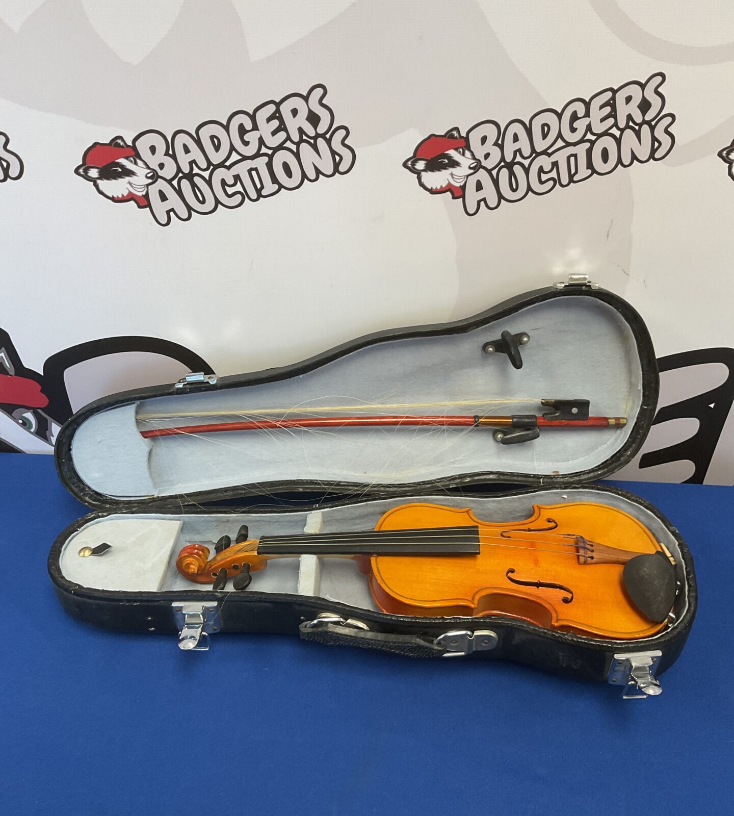 Small childs violin in case