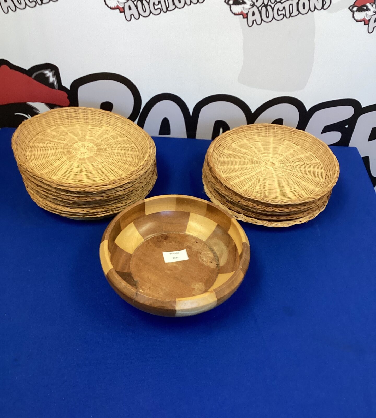 Set of raffia plates with wooden fruit bowl