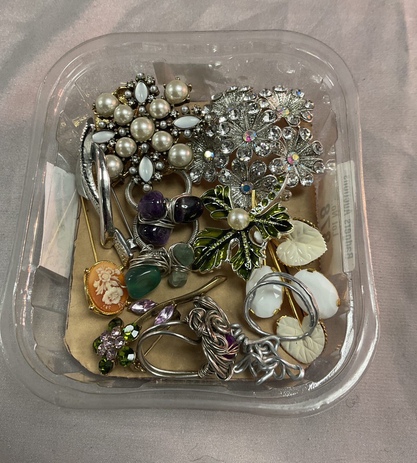 Tray brooches and rings