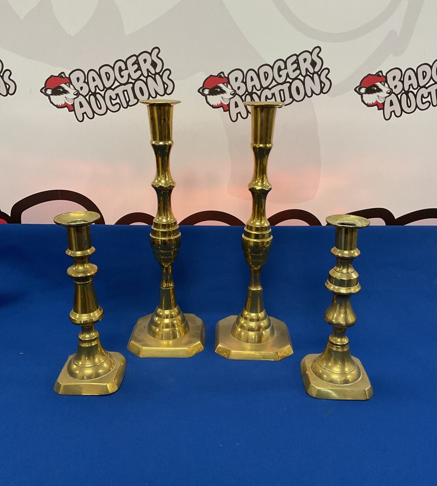 Two vintage pairs of brass candlesticks 8” & 12” tall