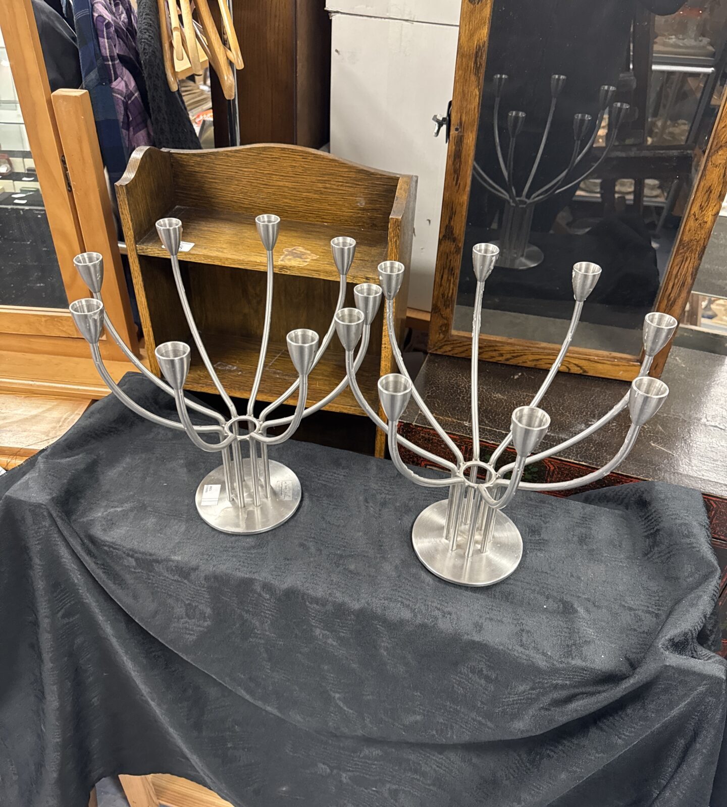 Two k & m hagberg heavy brushed steel candelabras