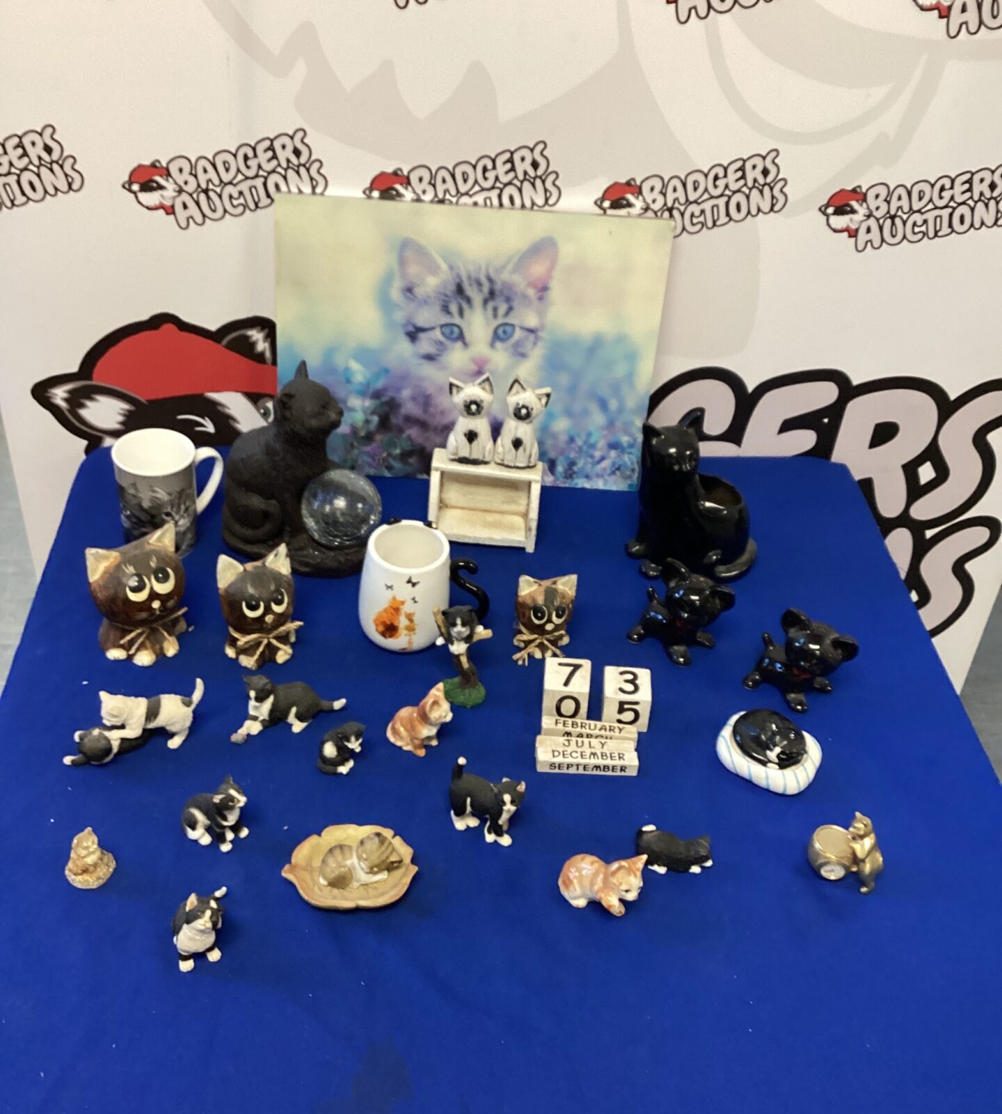 Collection of Cat figurines and other items