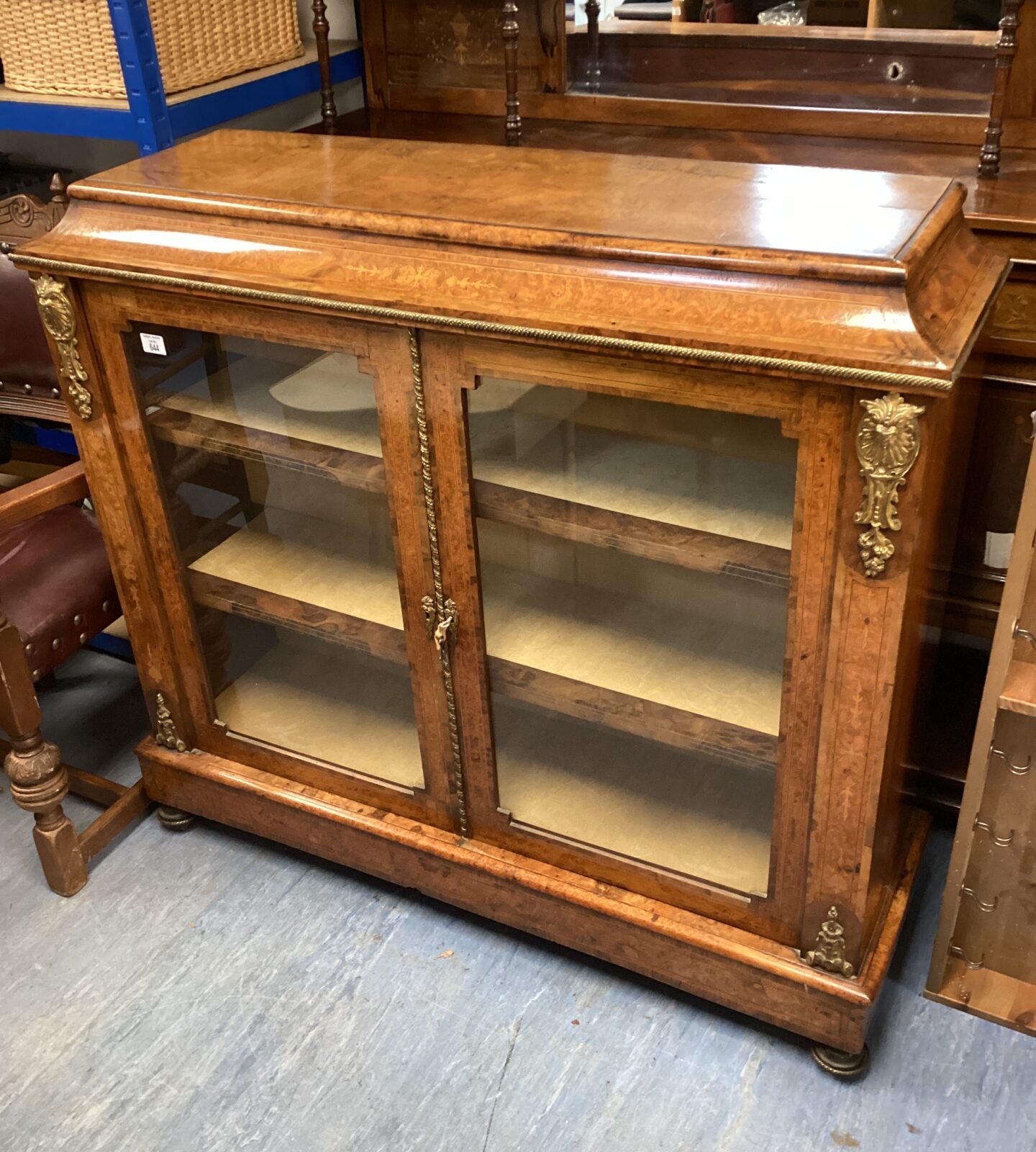19th century burr walnut pier cabinet with gilt ormolu mounts, velvet-lined shelves & marquetry, inlays & ornate carvings W47 x D15 x H44”