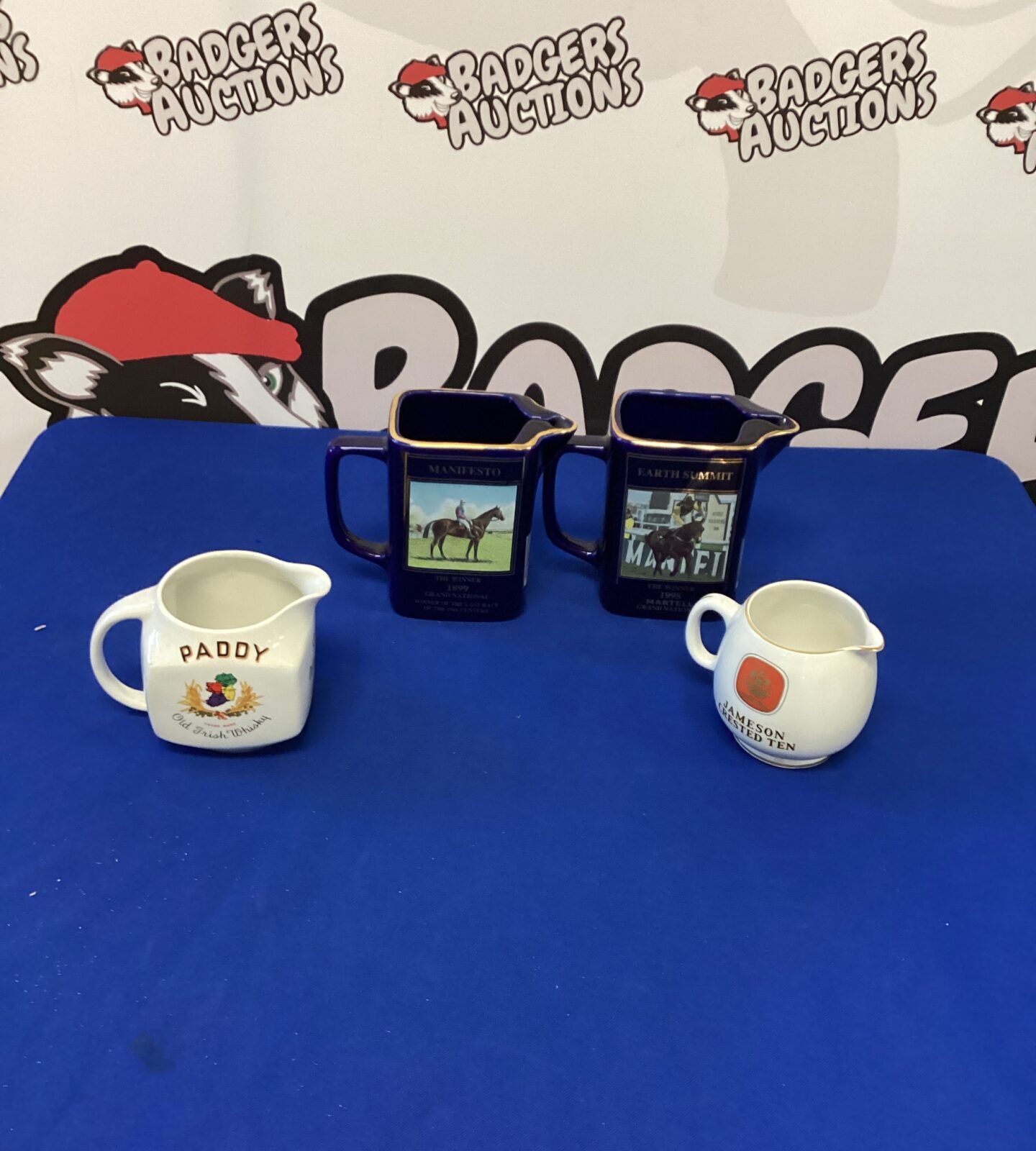 Four Racing Water Jugs inc Martell Grand National Winners