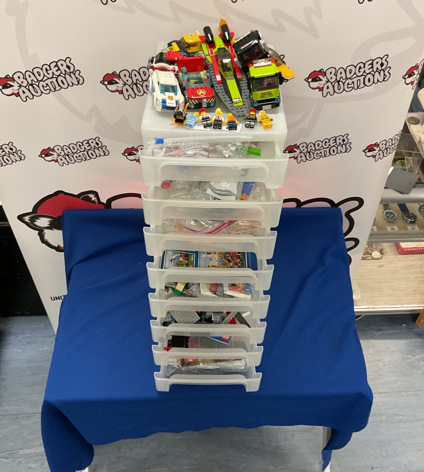 8 draw storage crate of mixed Lego inc sets, minifigures, mamuals and other