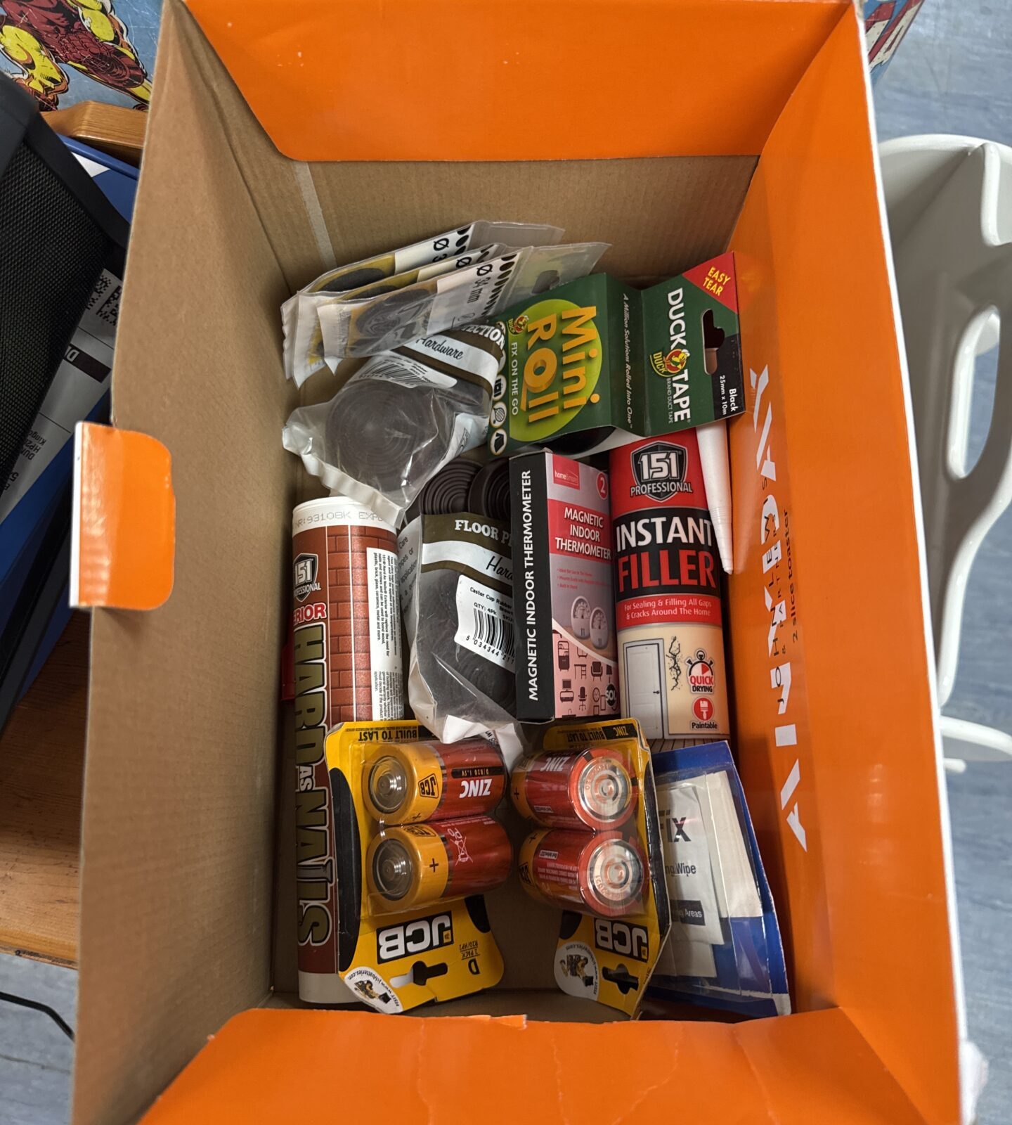 Box of new hardware items inc duck tape & filler