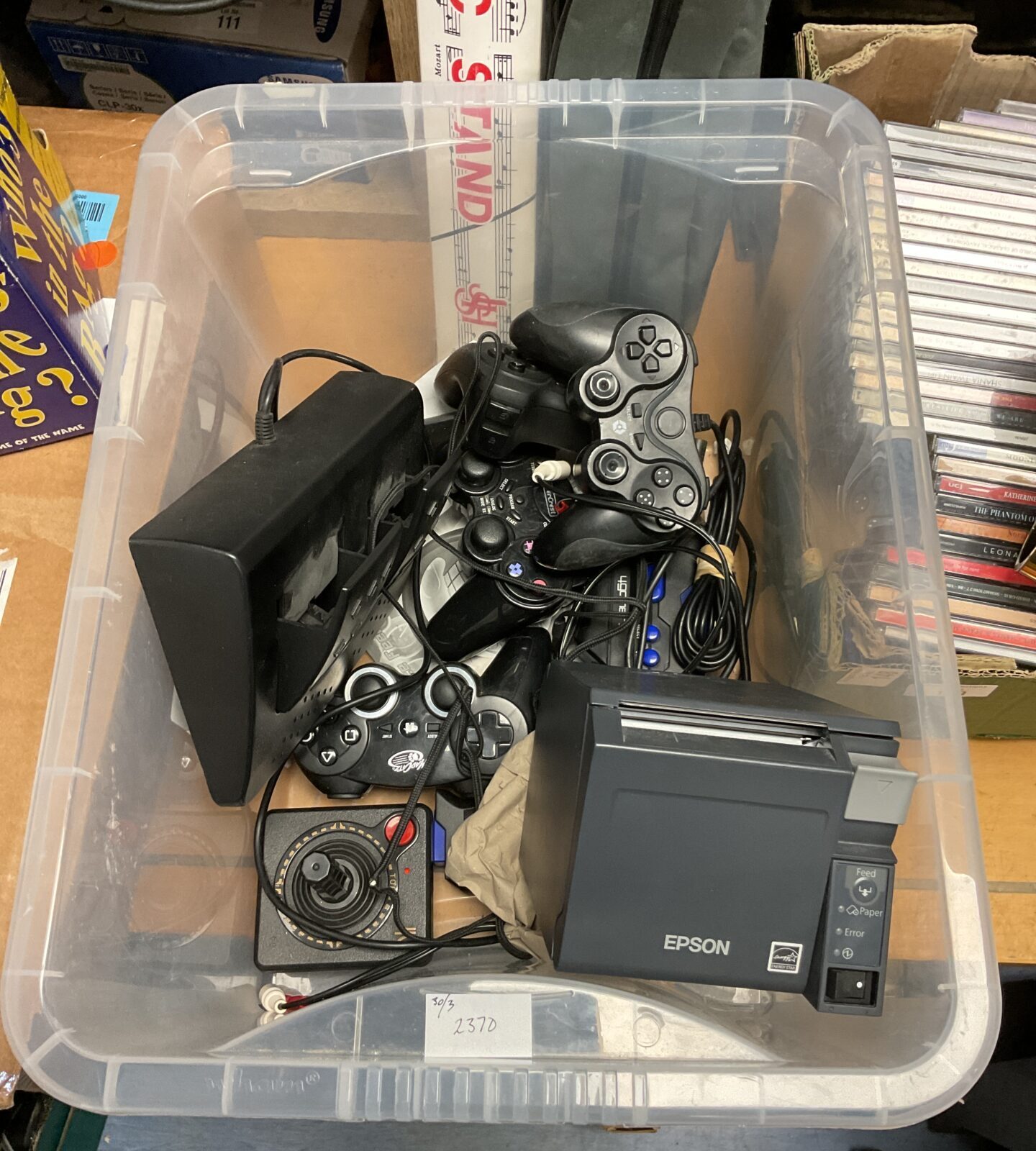 Box of gaming controllers including epson m296a label printer