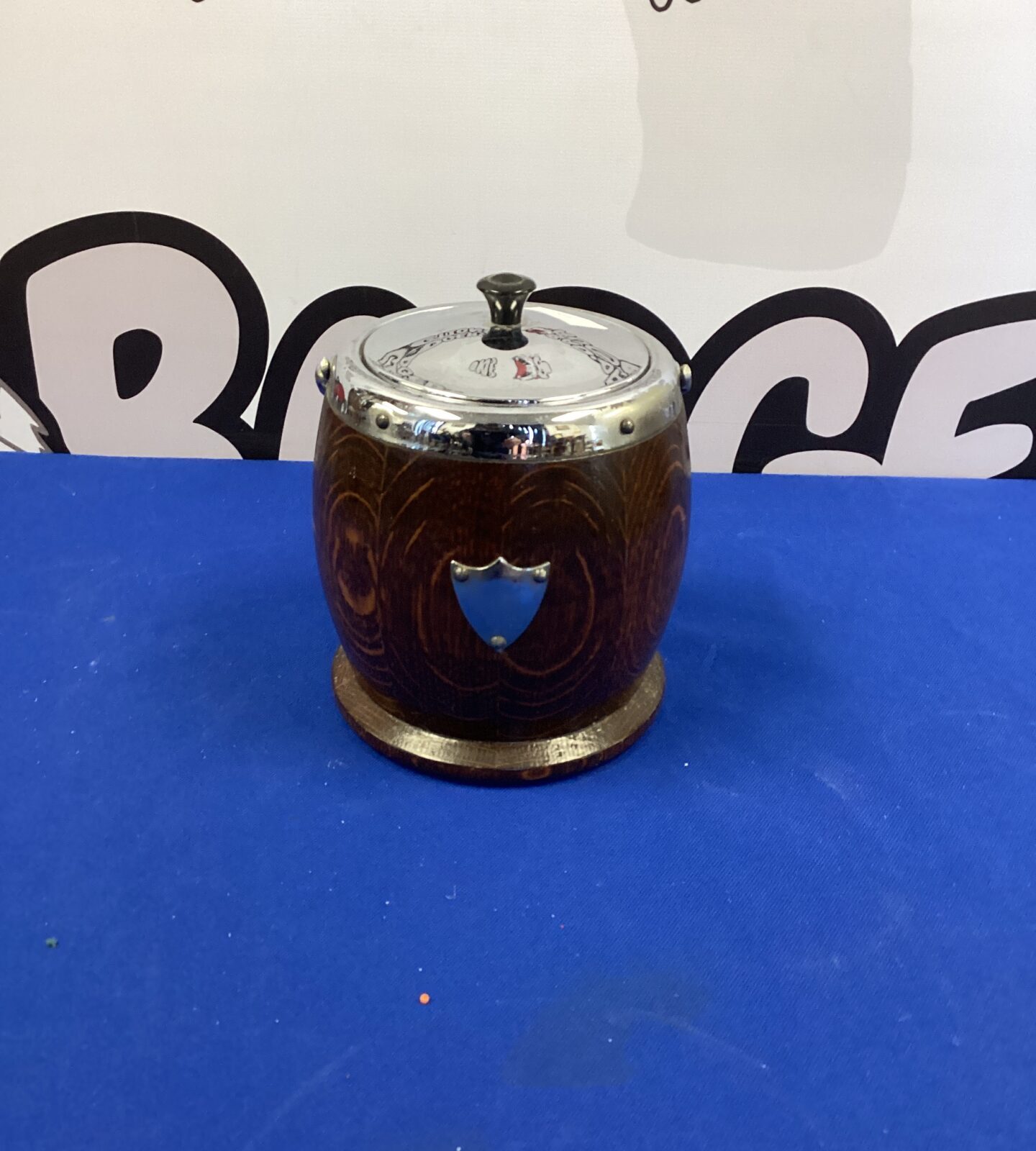 Vintage oak biscuit barrel with shield