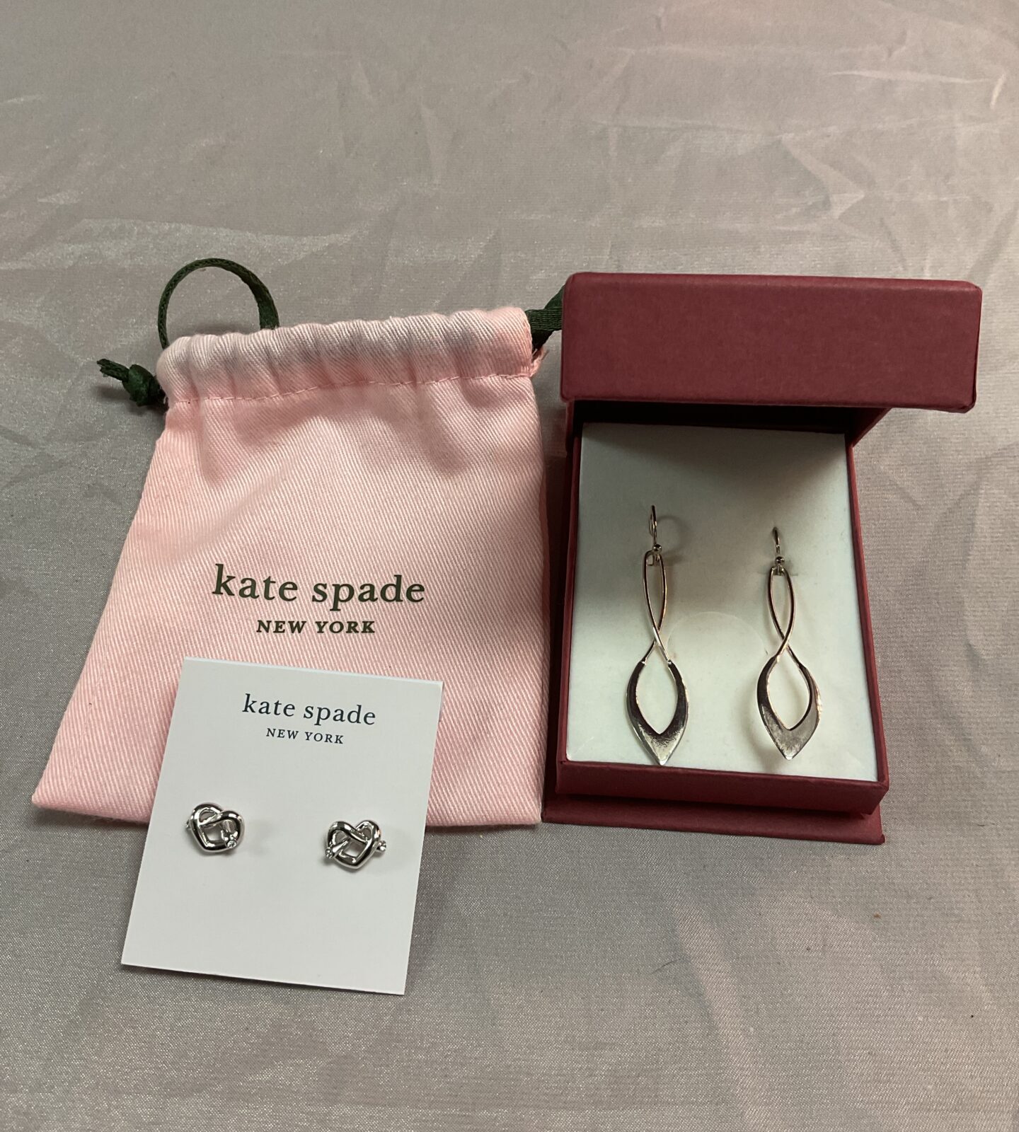 Two pairs of silver earrings inc Kate spade New York