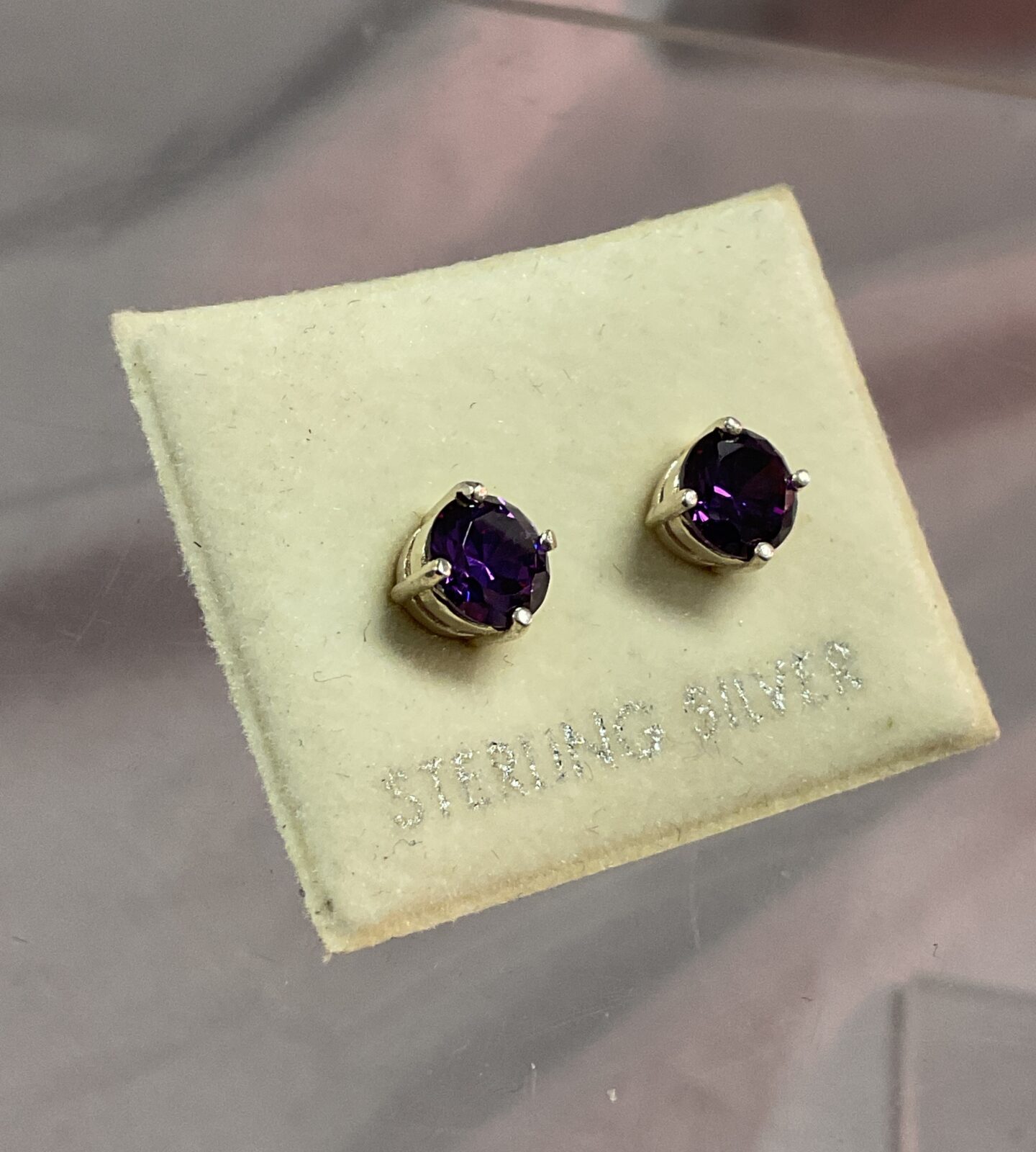 Pair of sterling silver amethyst set stud earrings