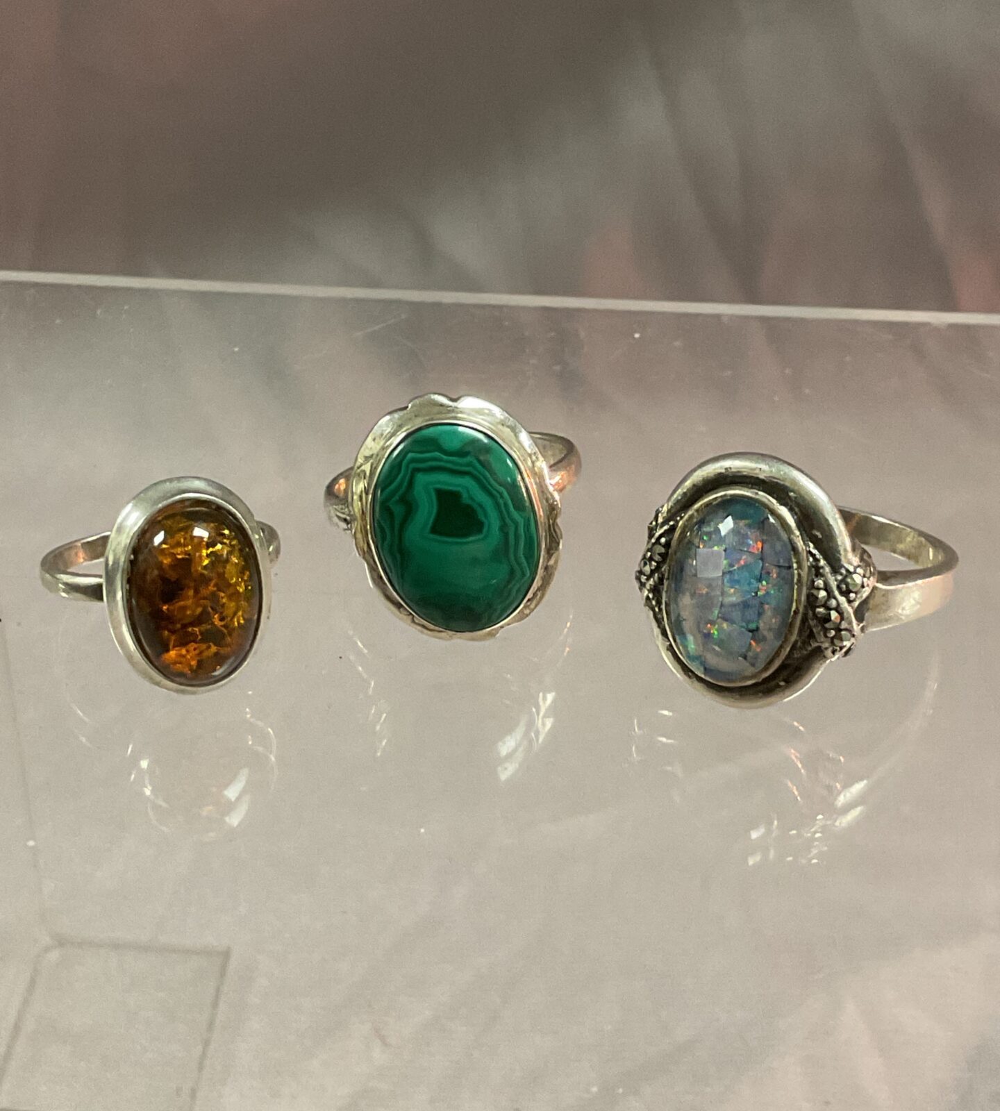 Three 925 Silver Rings set with malachite amber and opal Sizes K R T
