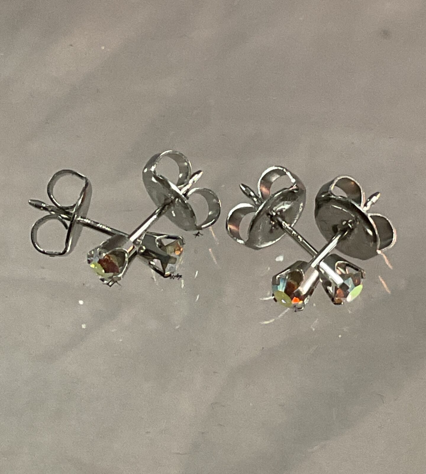 Two pairs 9ct white gold stud earrings