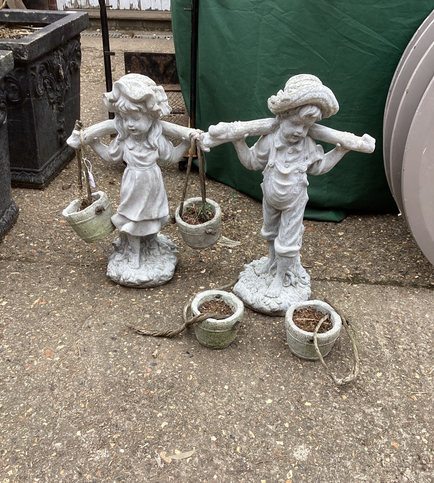 Two garden statues 24” Tall