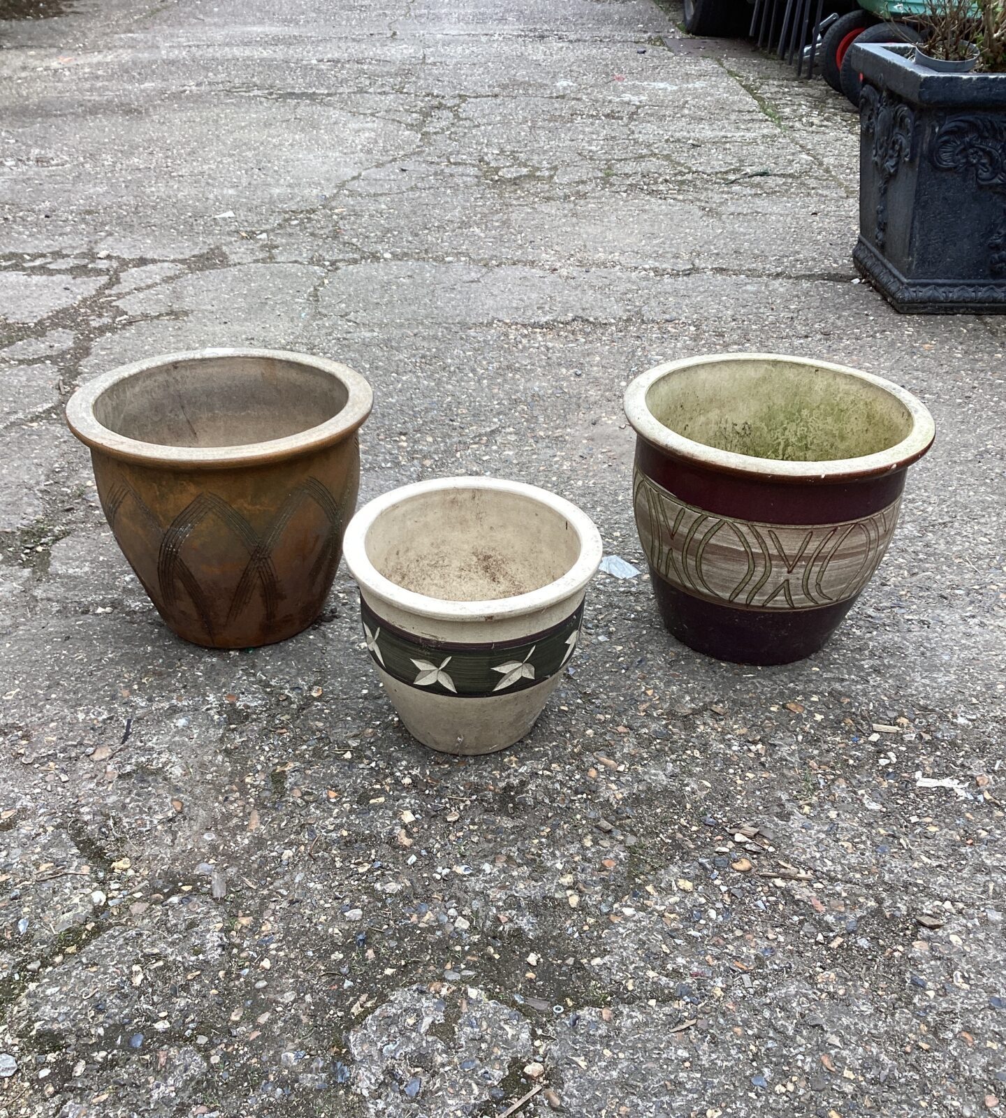 Three glazed garden planters