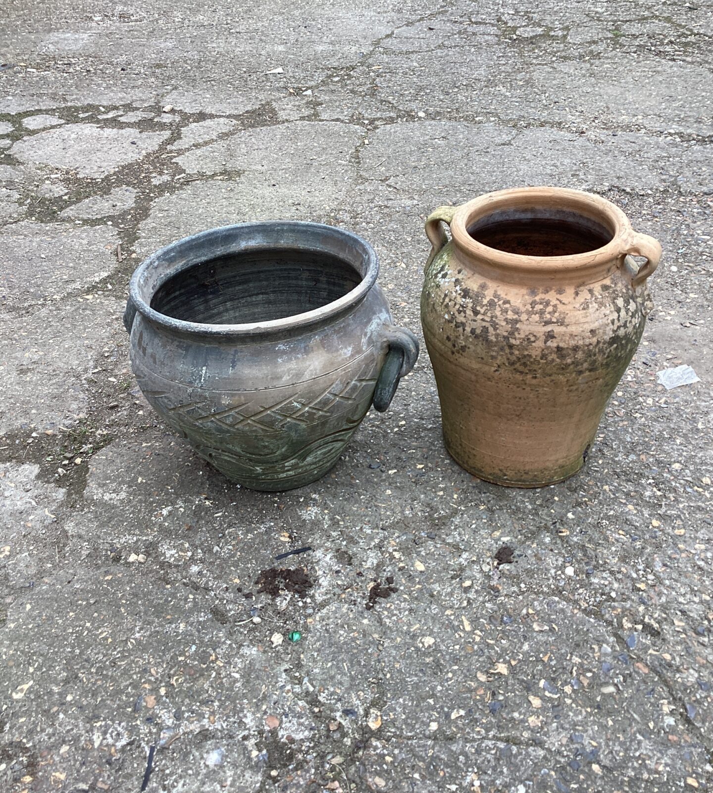Two terracotta garden urns