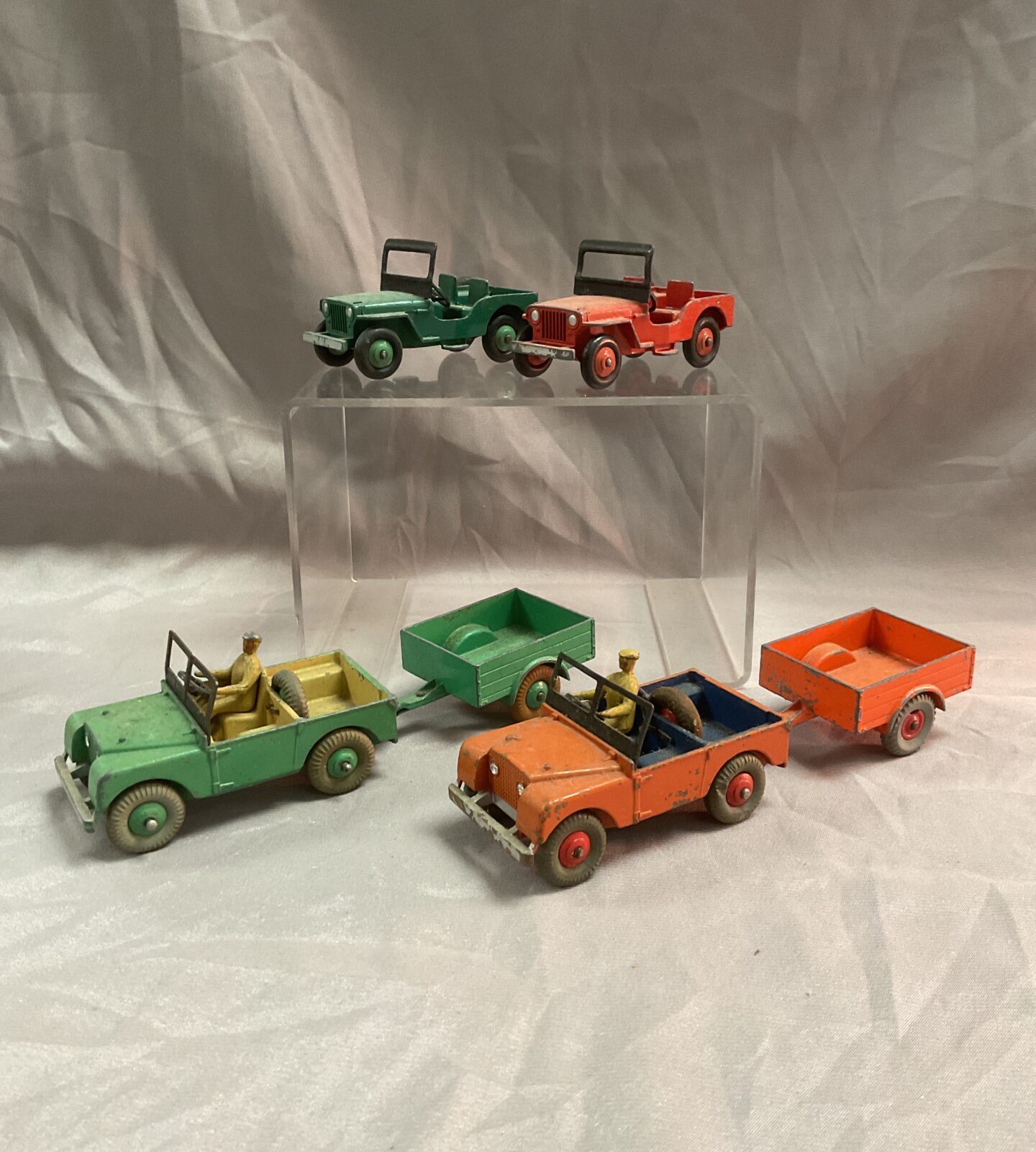 Two dinky toys landrovers and trailers and two jeeps