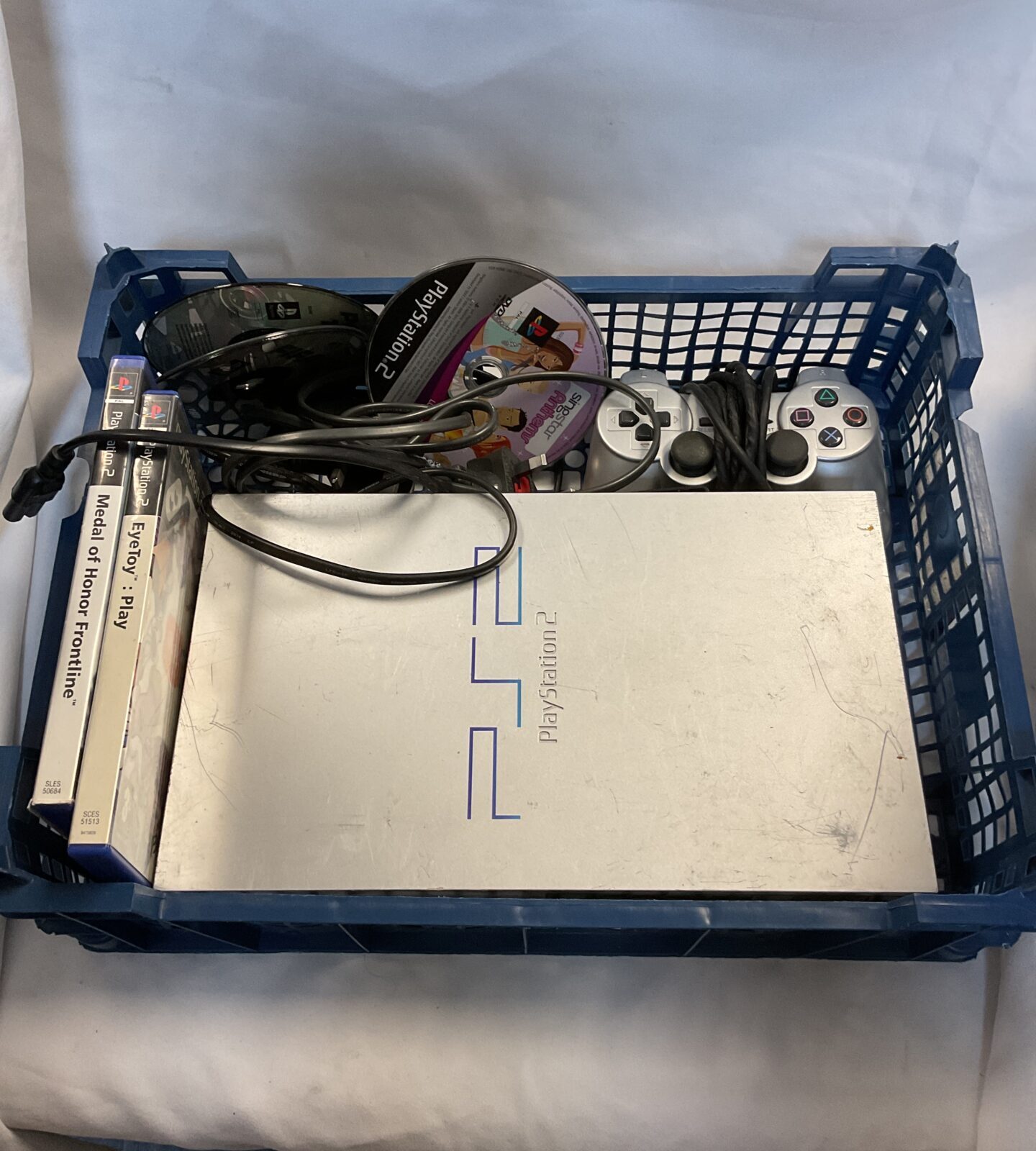 Silver sony PlayStation 2 console