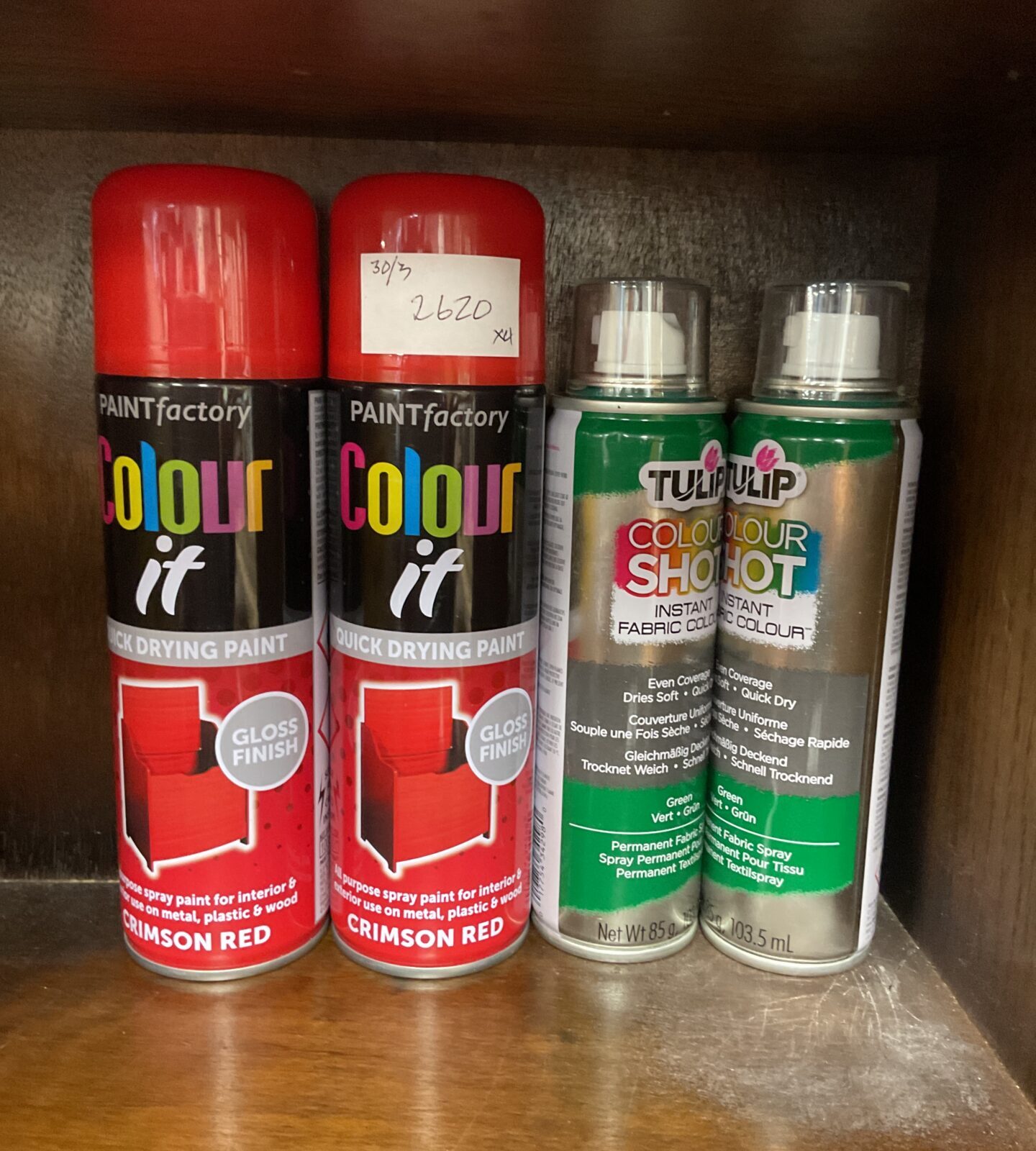 Two colour it quick drying red spray paint and two cans of tulip instant green fabric colour